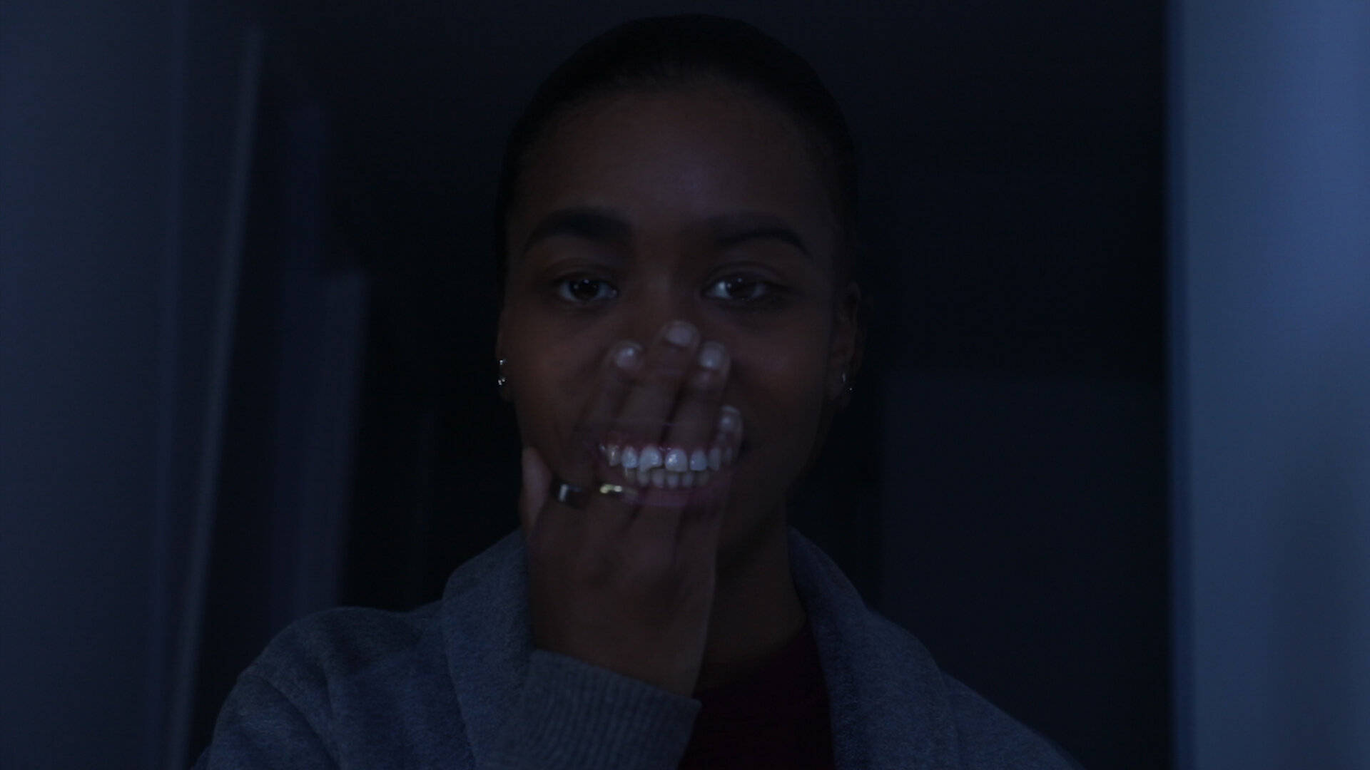 A still from The Wounded and The Watcher showing the watcher reacting