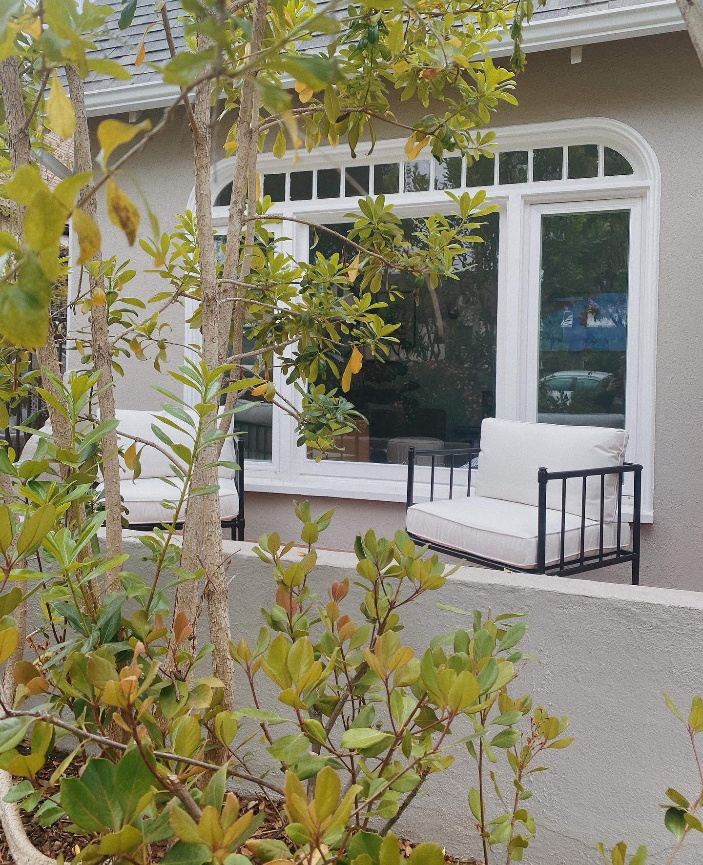 A little peak at this super cute front porch! Can not wait for our rustic raw concrete side table to bring the space together!