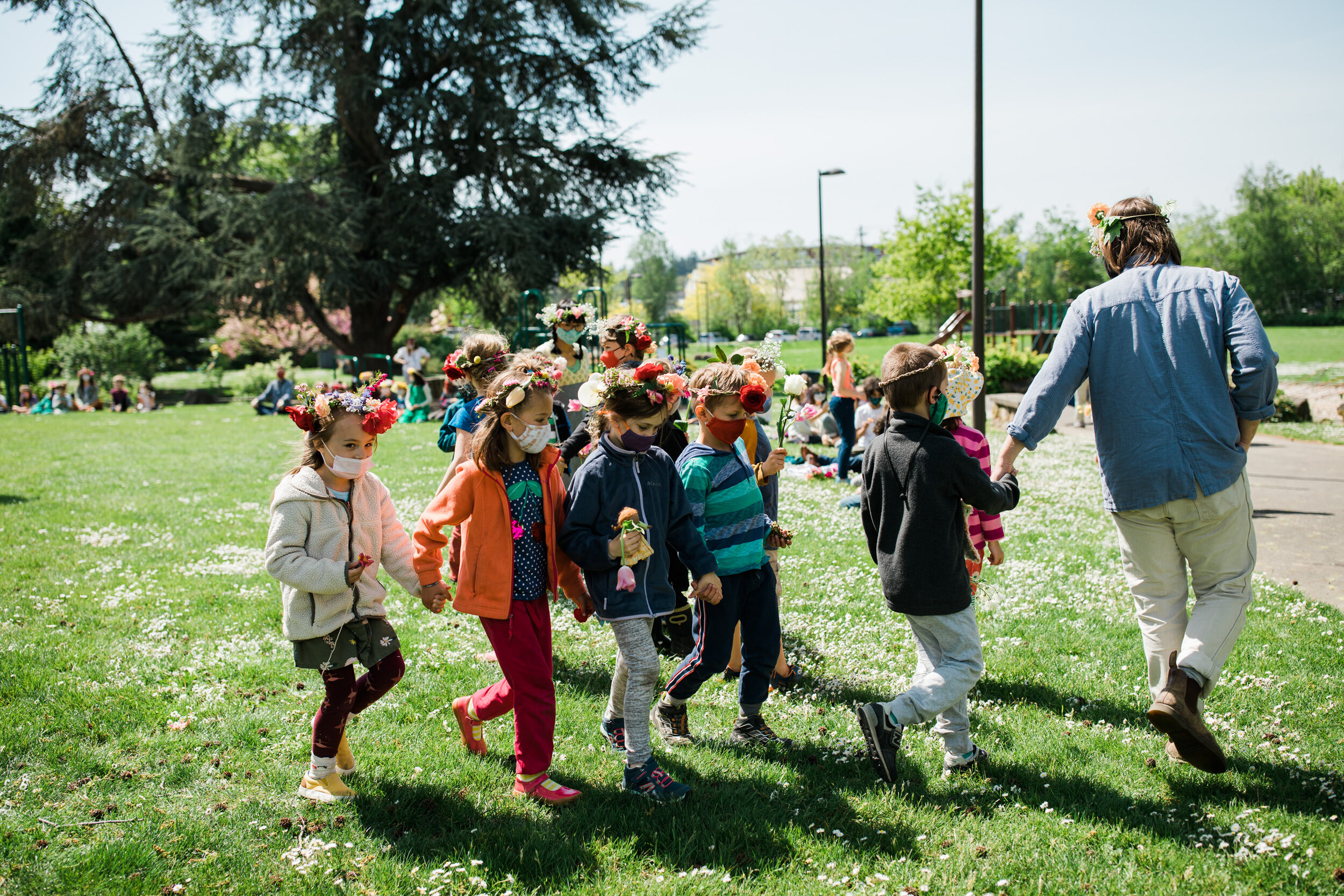Kindergarten children depart the May Pole Dance