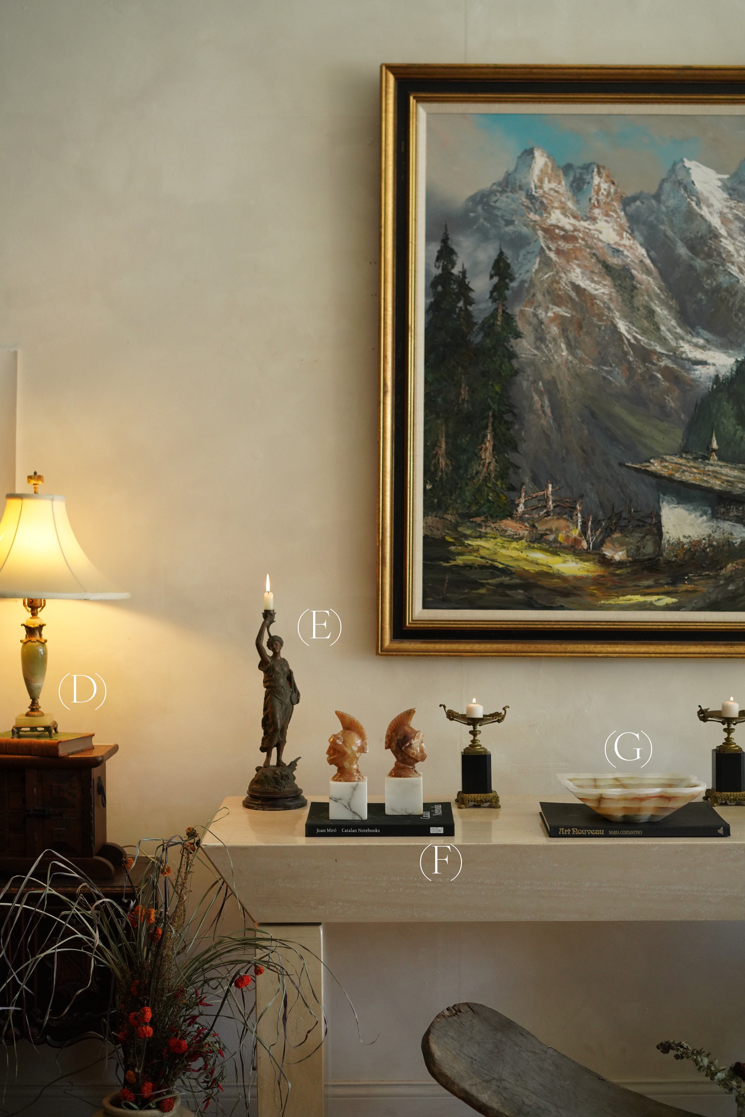 (D) Vintage onyx lamp - $129 (pair available)
(E) Antique bronze candle holder - $289
(F) Vintage onyx and marble bookends - $259
(G) Sculptural fluted onyx bowl - $175