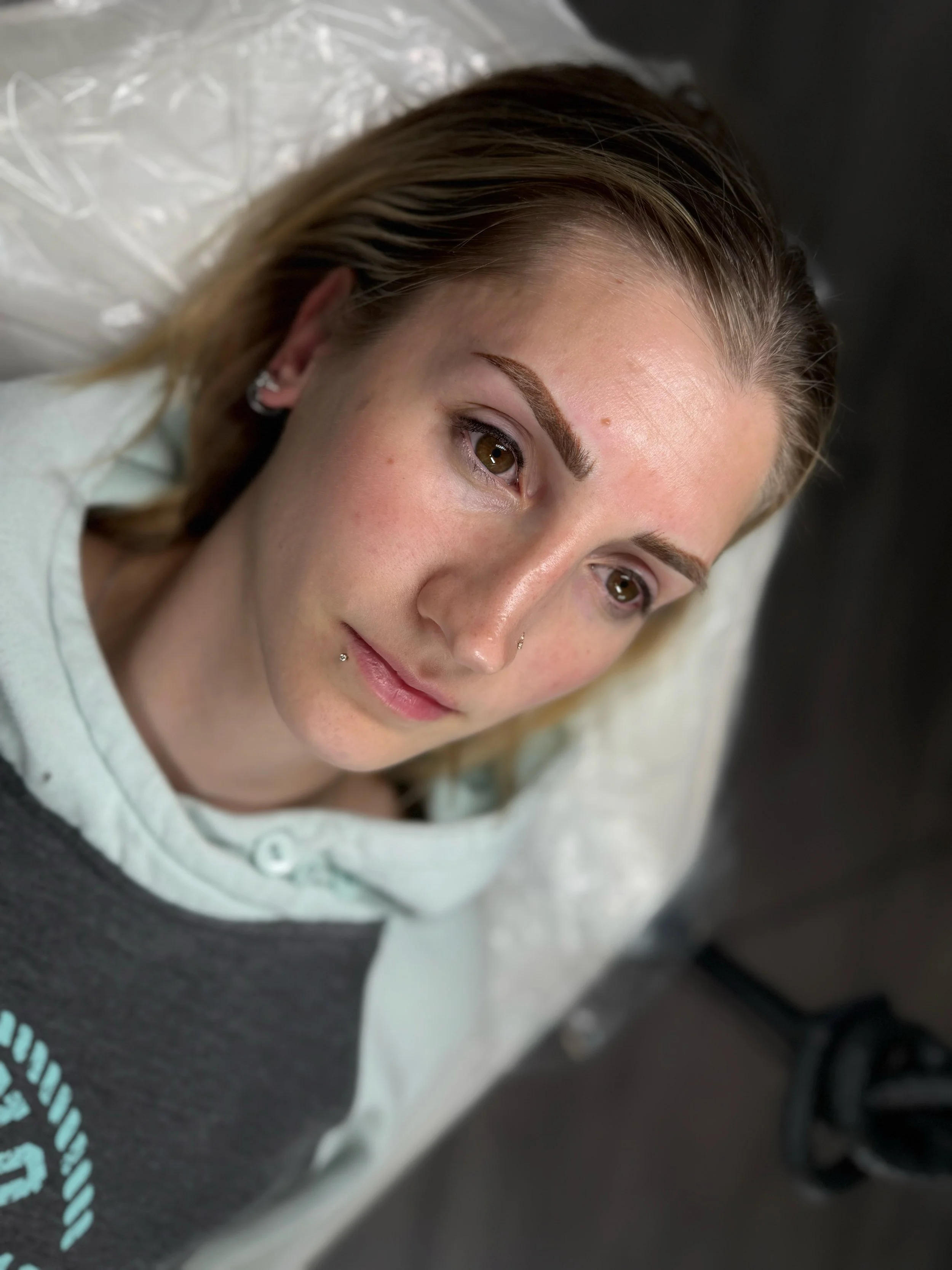 Powder brows immediately after cosmetic tattoo session