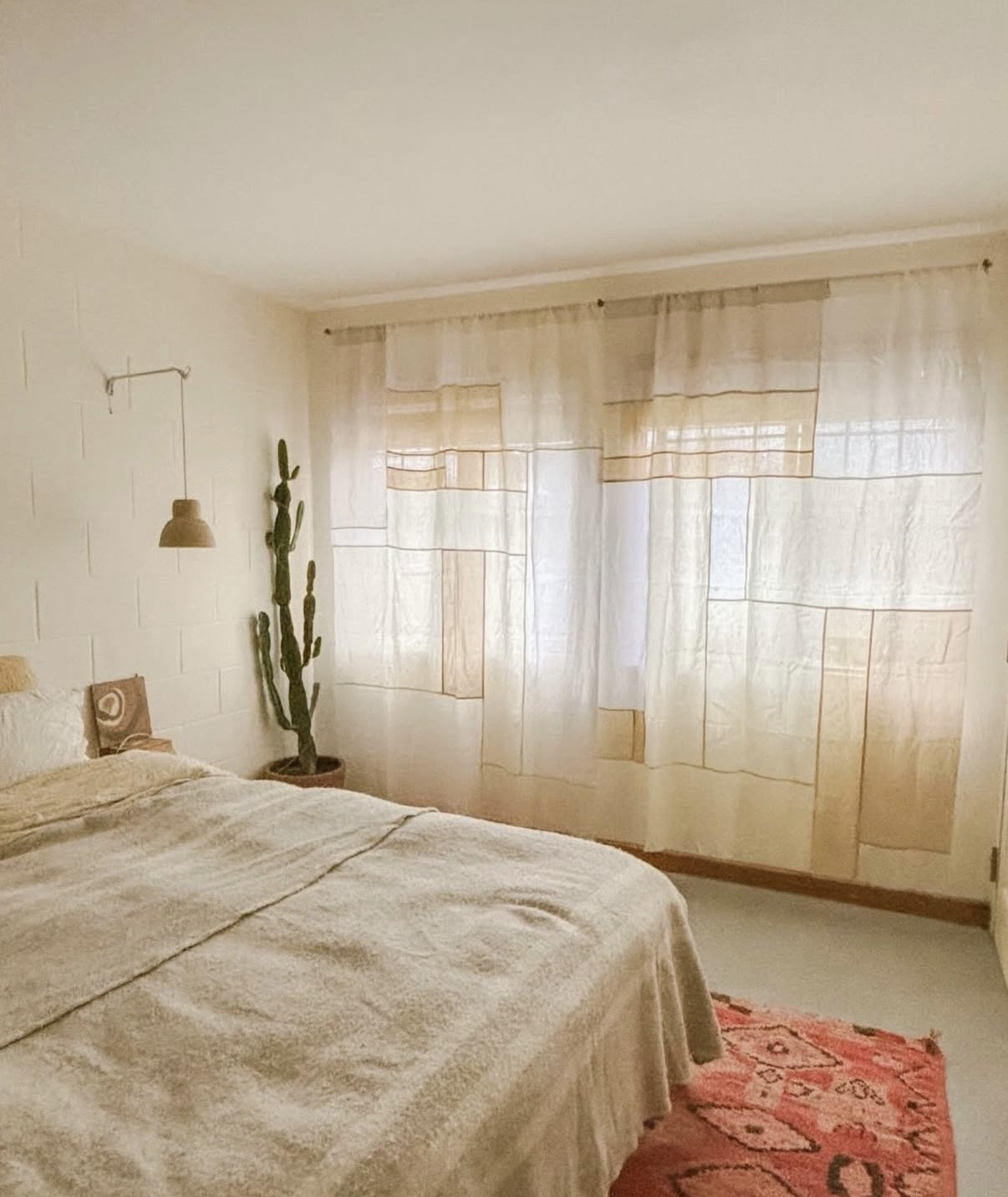 Bedroom with panel curtains
