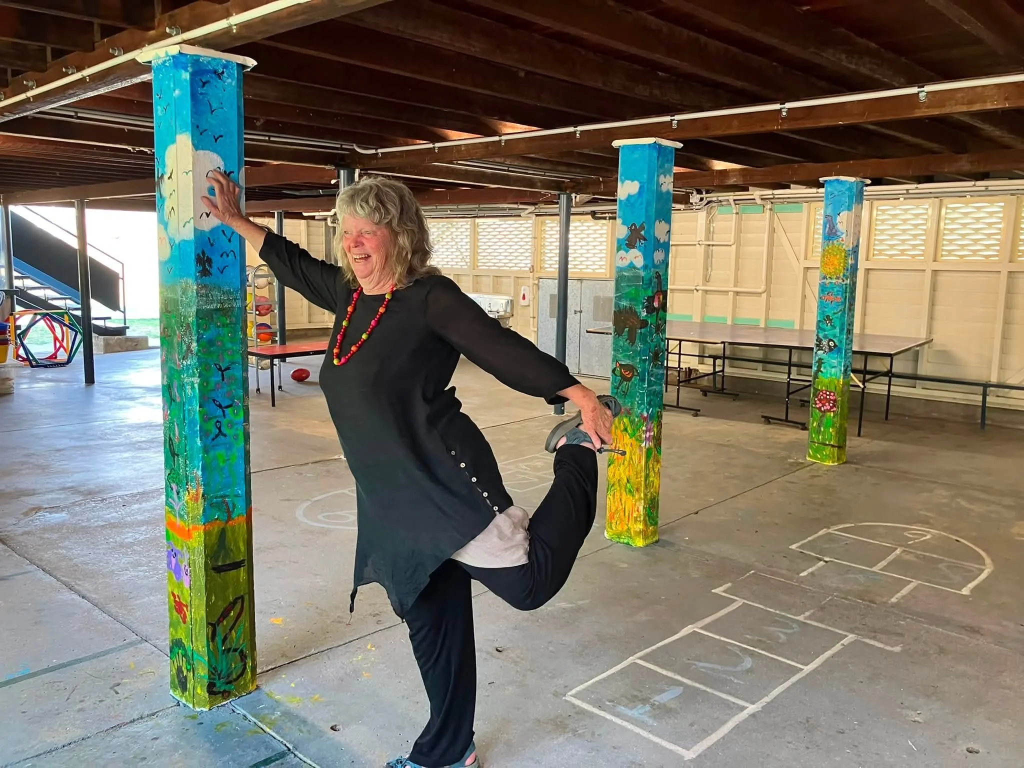 The finished poles, painted by the students under the direction of our Pillars Queen, Barb Benham.