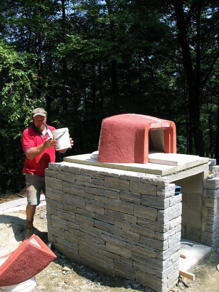 John starts the process of building the oven dome.