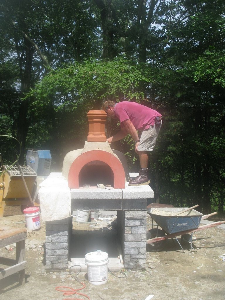 John peeks down the chimney pot.