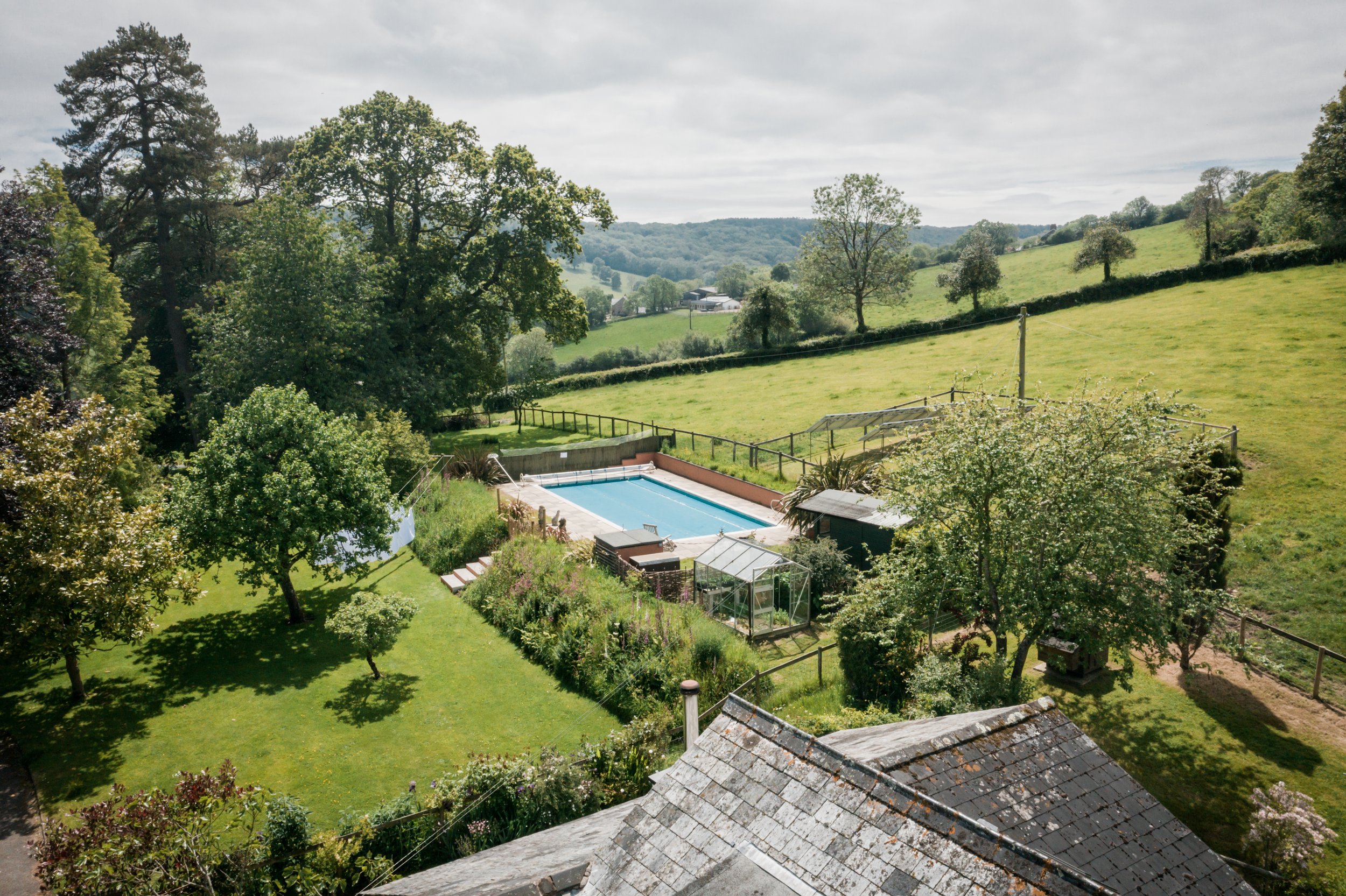 Overlooking-View-of-the-Swimming-Pool-of-Glebe-House-in-Devon-and-Beer.jpg