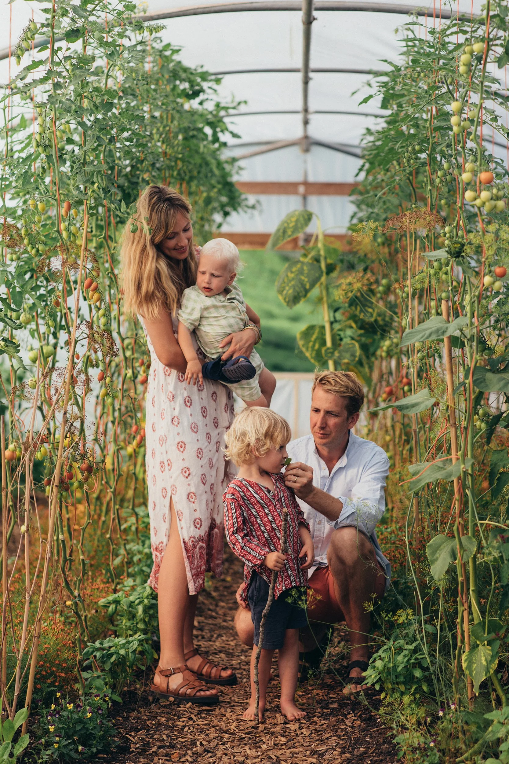 a family picture of Hugo and Olive as the homeowners of Glebe House Devon