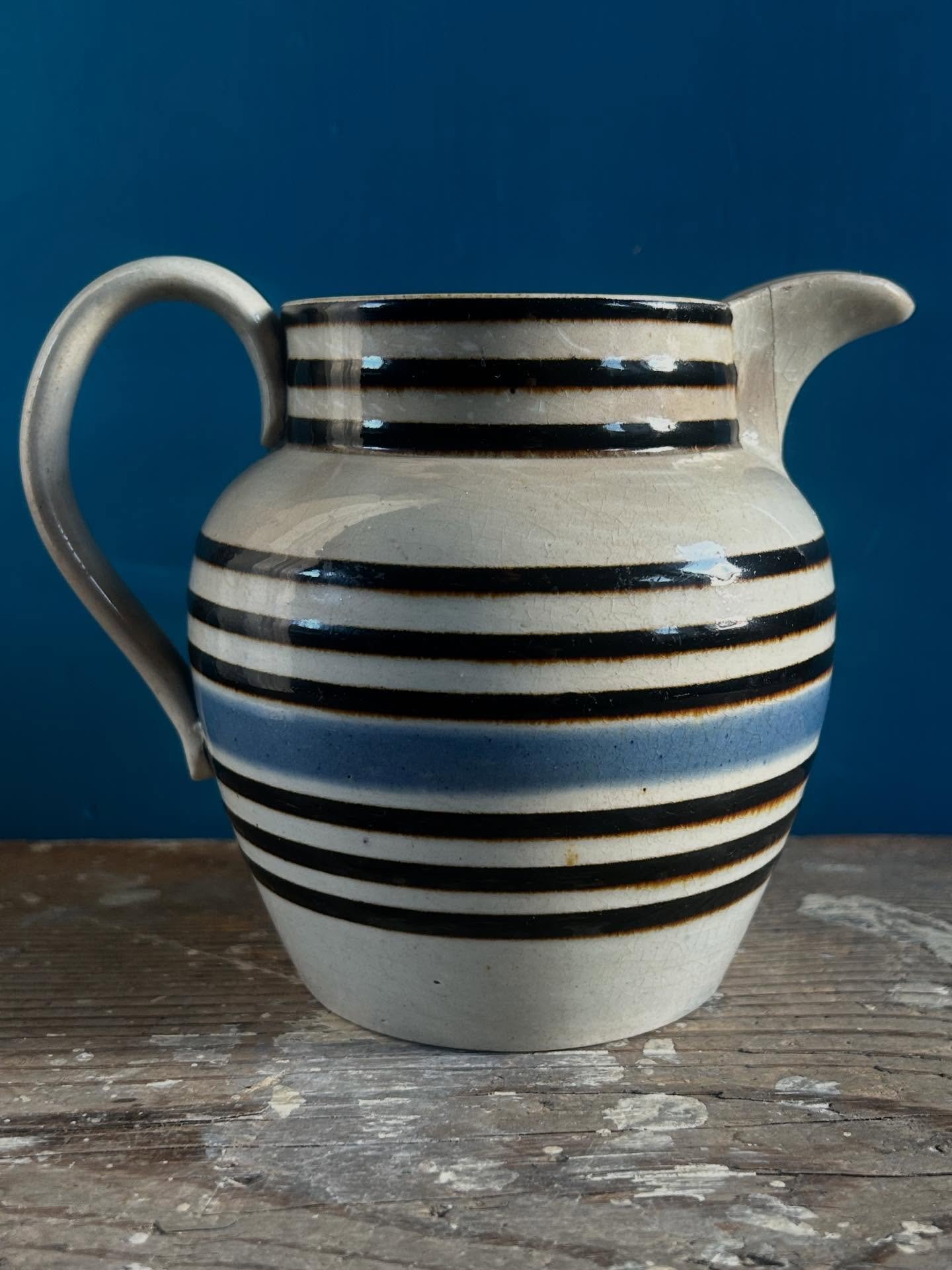 19th century English mochaware jug with banded decoration. 
Some historical restoration, crack lines and stains. These don&rsquo;t turn up very often and this one is stable and displays well 
Height 13cm &pound;70
#antique #mochaware #englishpottery