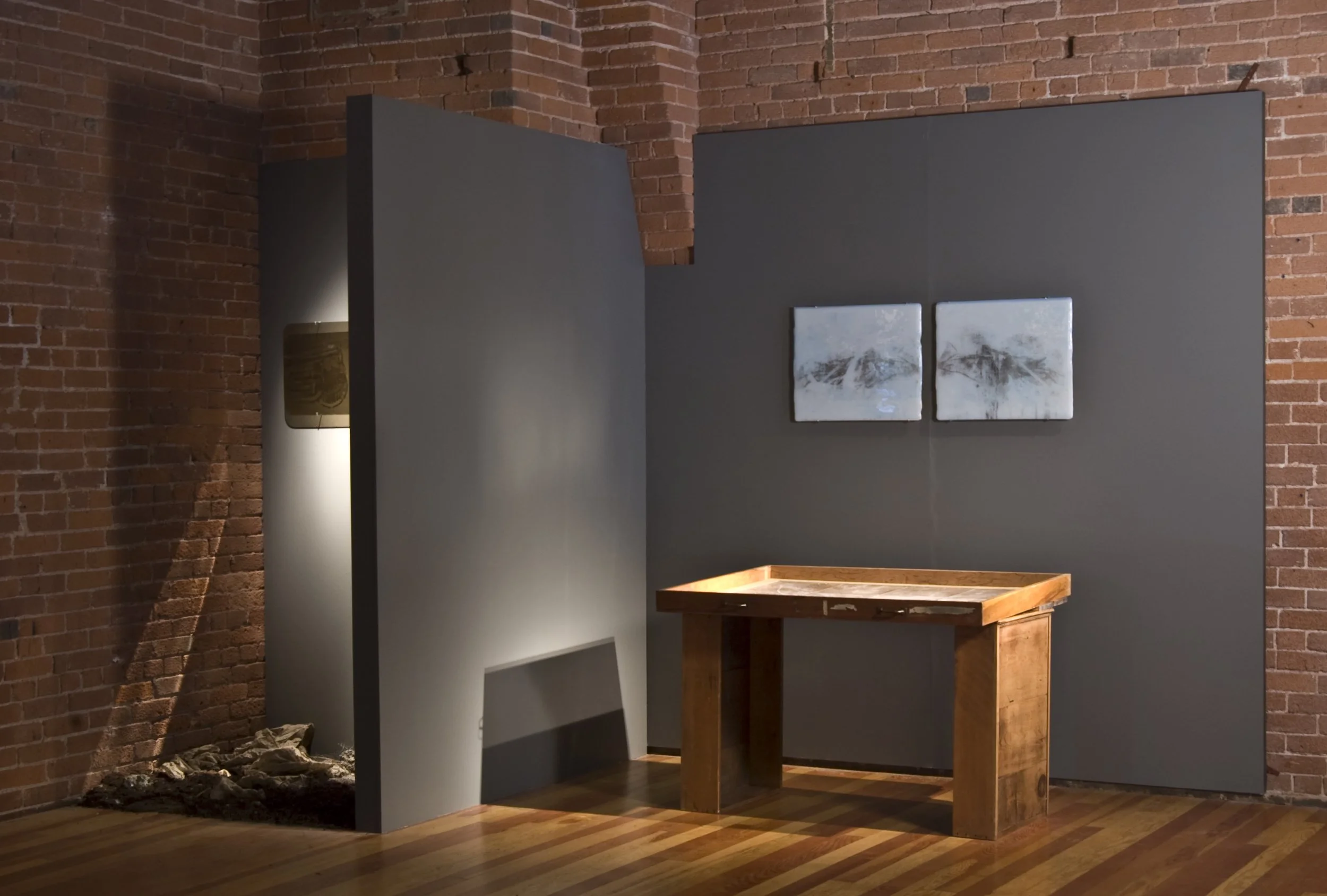 Reconstruction, 2010, kilnformed glass, wood, dirt, mirror