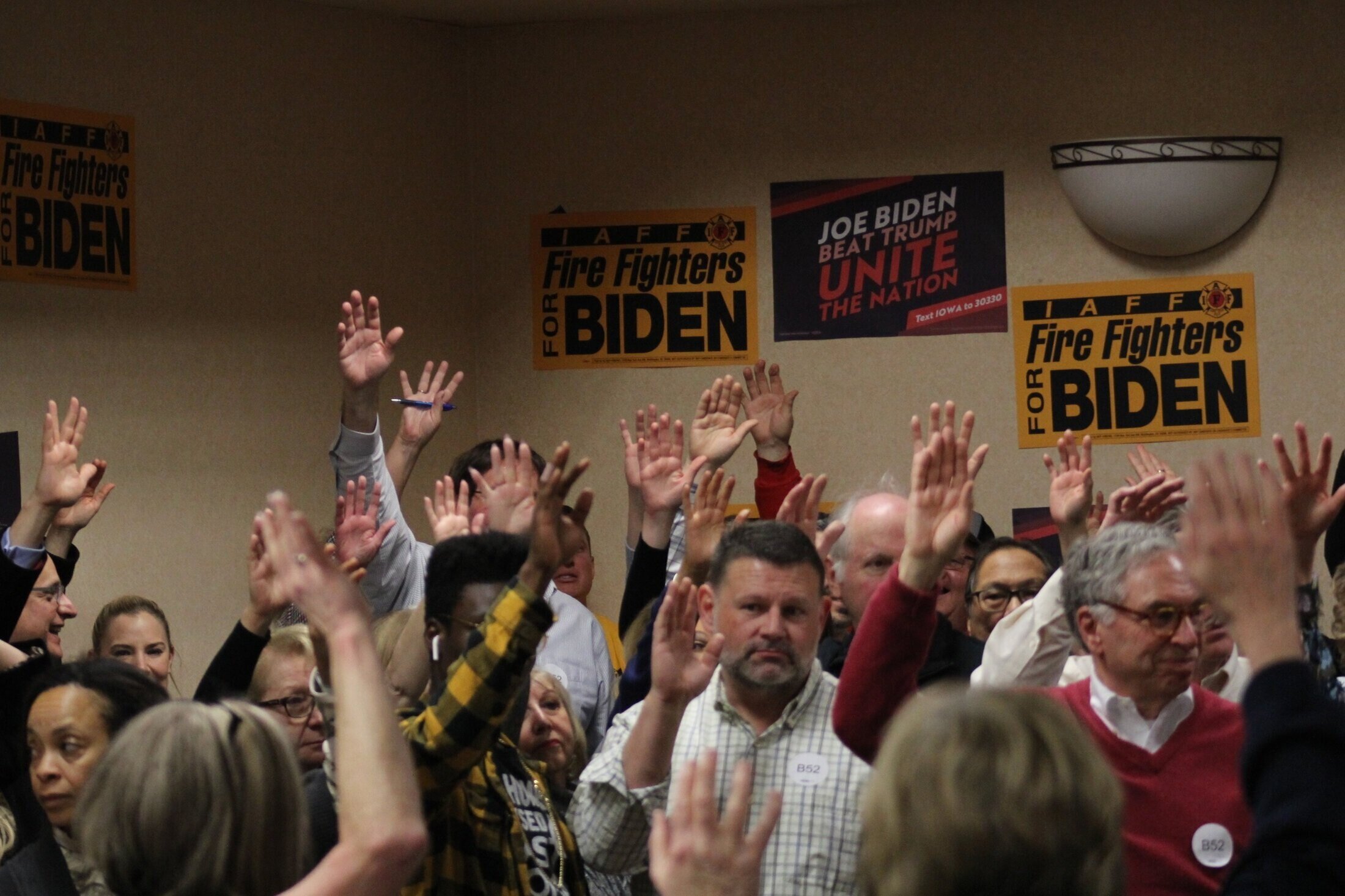 Attendants at the Iowa caucus in Bettendorf showing early support for Biden. (Alicia Olejniczak/TKS)
