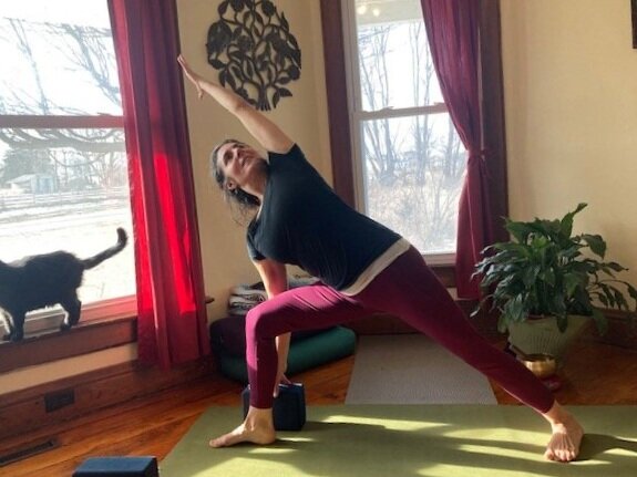 Kristina Hope practicing yoga in her space set up to teach her Knox Zoom classes. (Courtesy of Kristina Hope)