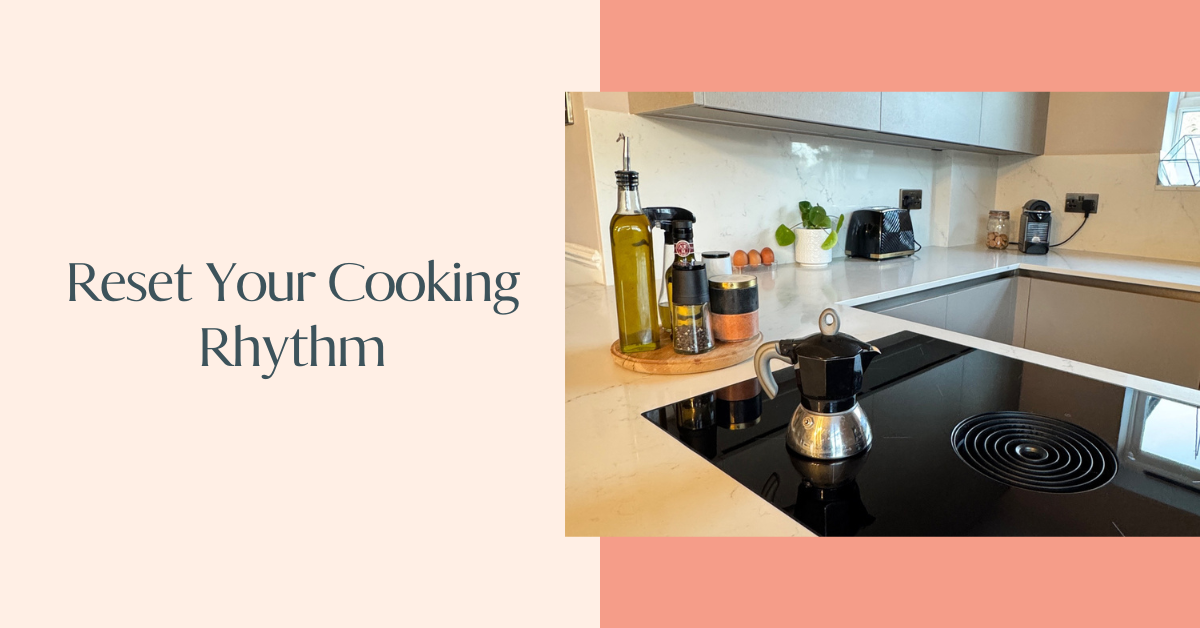 Image of a clean kitchen space, with moka coffee pot, oilive oil bottles and other kitchen equipment.