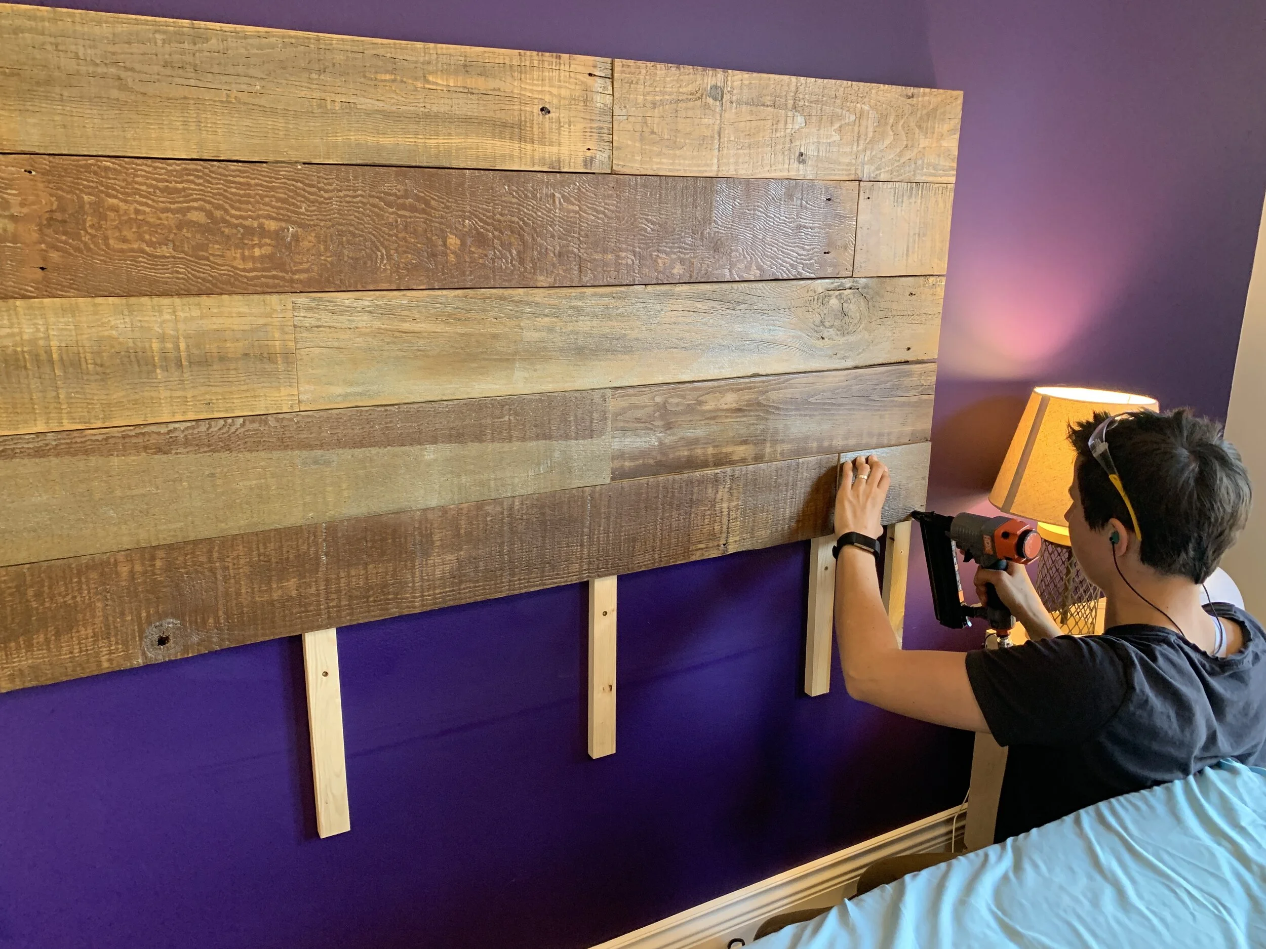 Headboard building, I built a really neat headboard out of old fencing panels for us. We already had all the materials, the whole project cost $0! .JPG