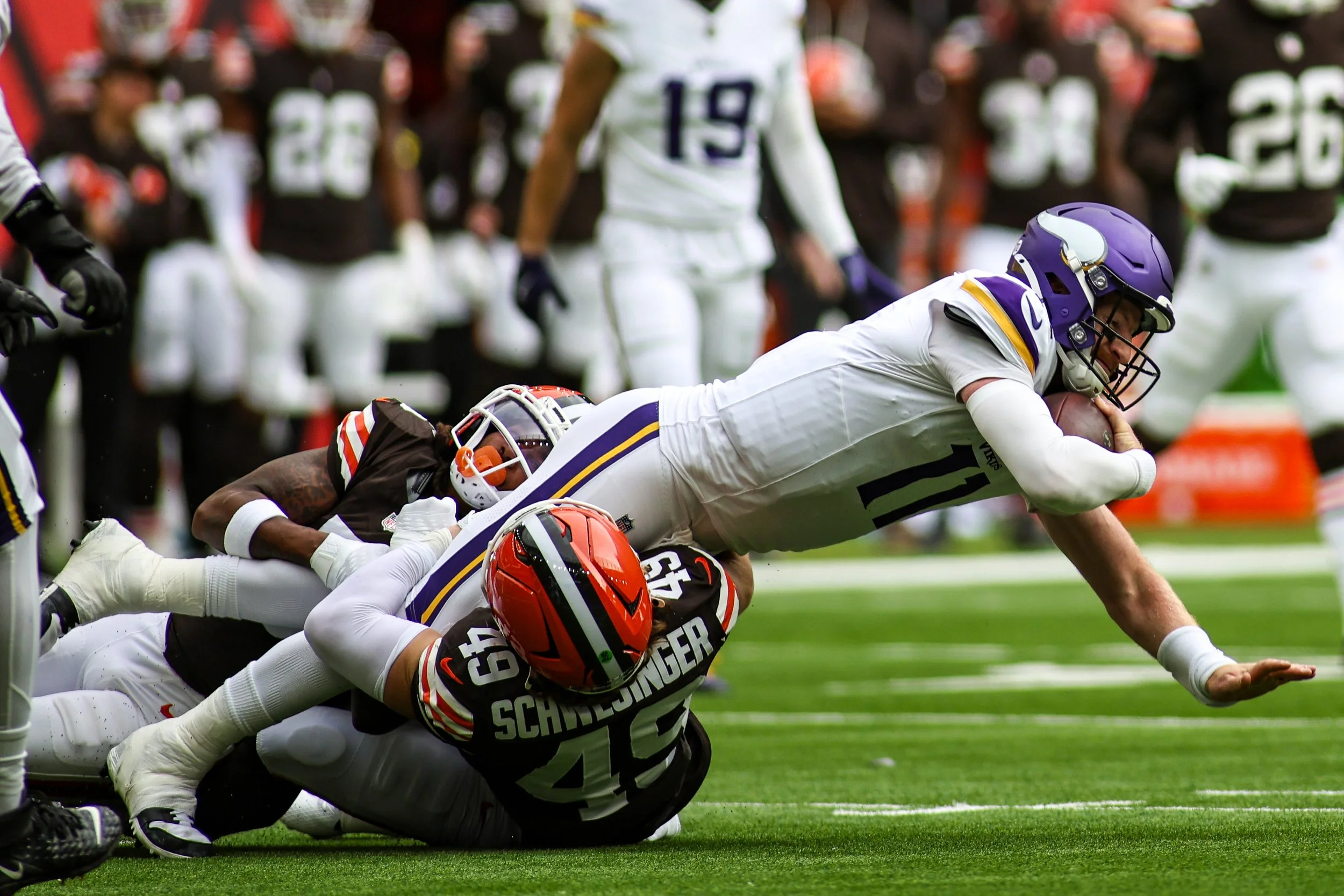 Minnesota Vikings quarterback CJ Wentz sacked by Cleveland Browns' Schwesinger