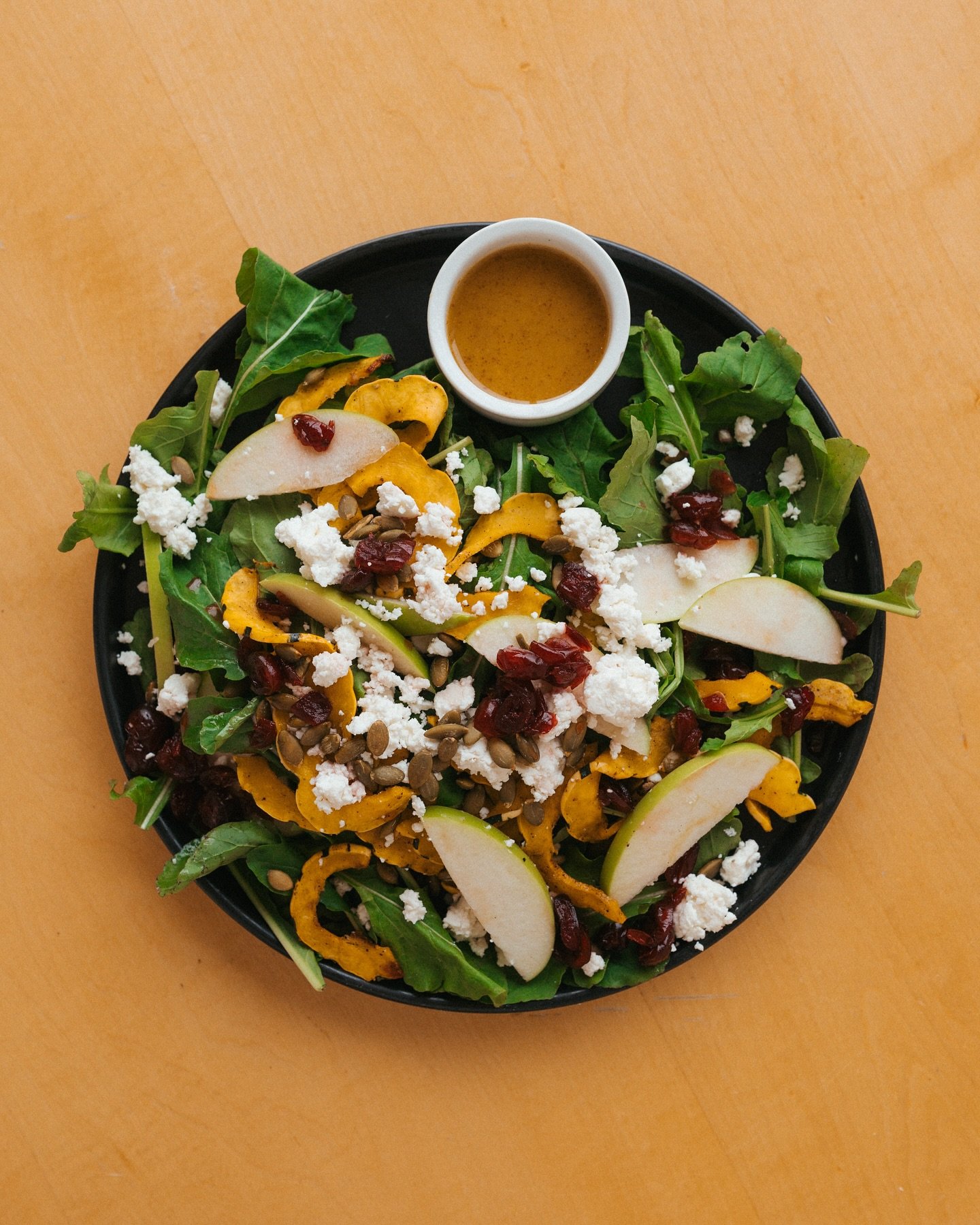 This is your reminder to eat some leafy greens 🥬  our favorite way is with lots of cheese&hellip; 

Nana&rsquo;s arugula salad with delicata squash, toasted pepitas, fresh local apple, pickled cranberries, house made miso honey mustard, and goat che