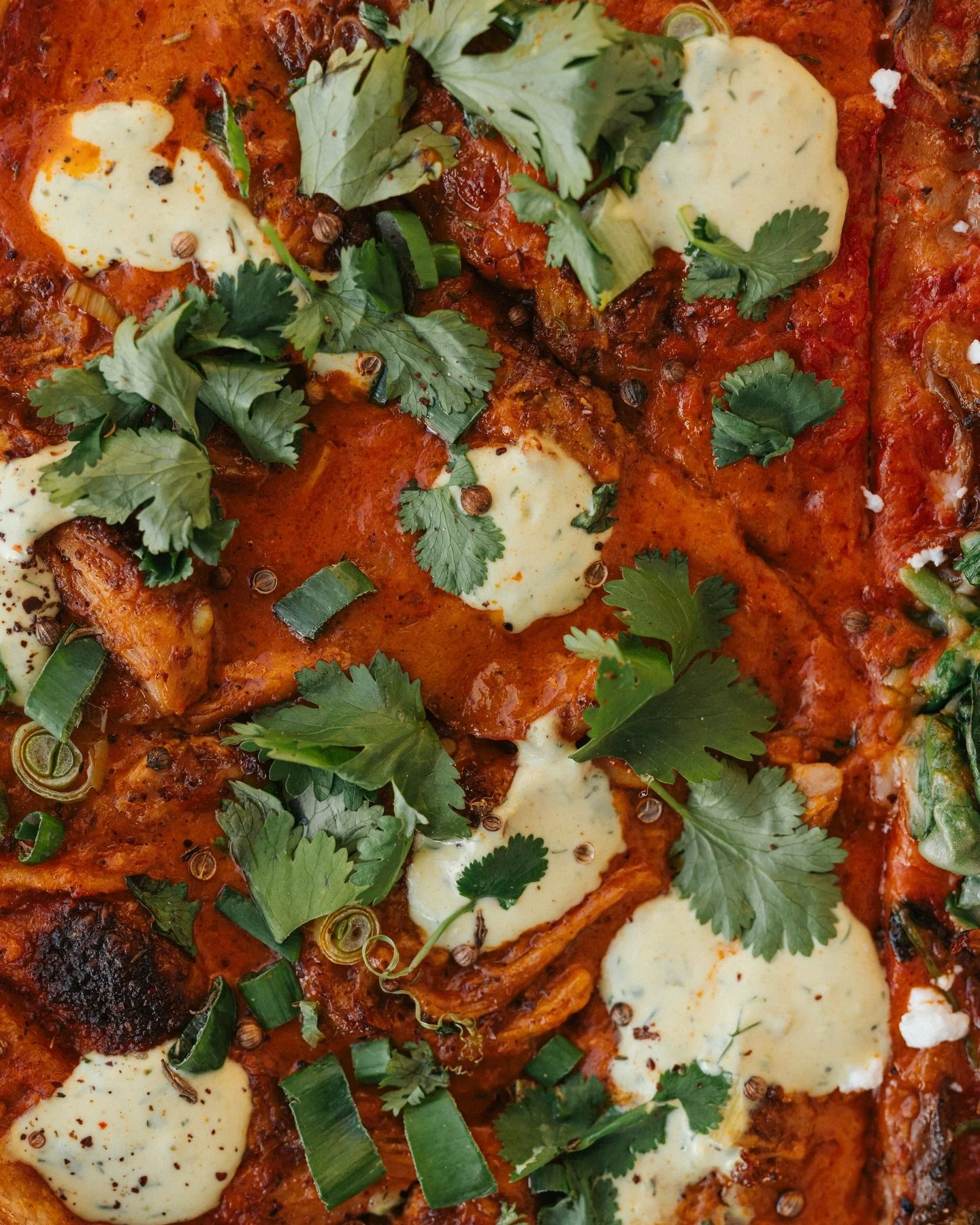 Up close and personal with our new butter chicken pizza 🧈🍗🍕 stop by and stock up on your snow day goodies, we&rsquo;re open today and Saturday, but we&rsquo;ll be CLOSED on Sunday for our forecasted snow storm! 🌨️ our Monday hours are TBD, keep a