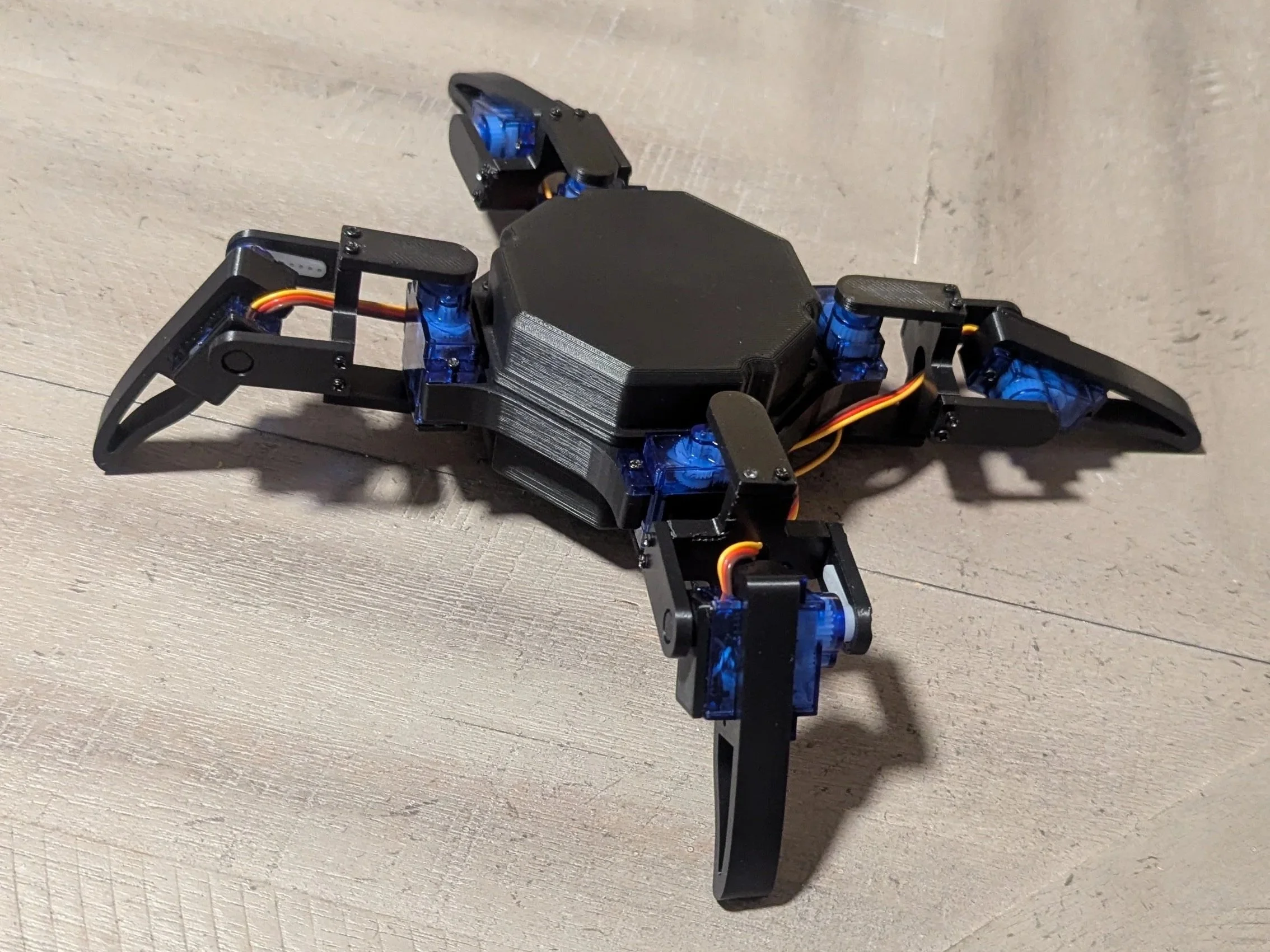 Open Source Low-Cost Quadruped Robot