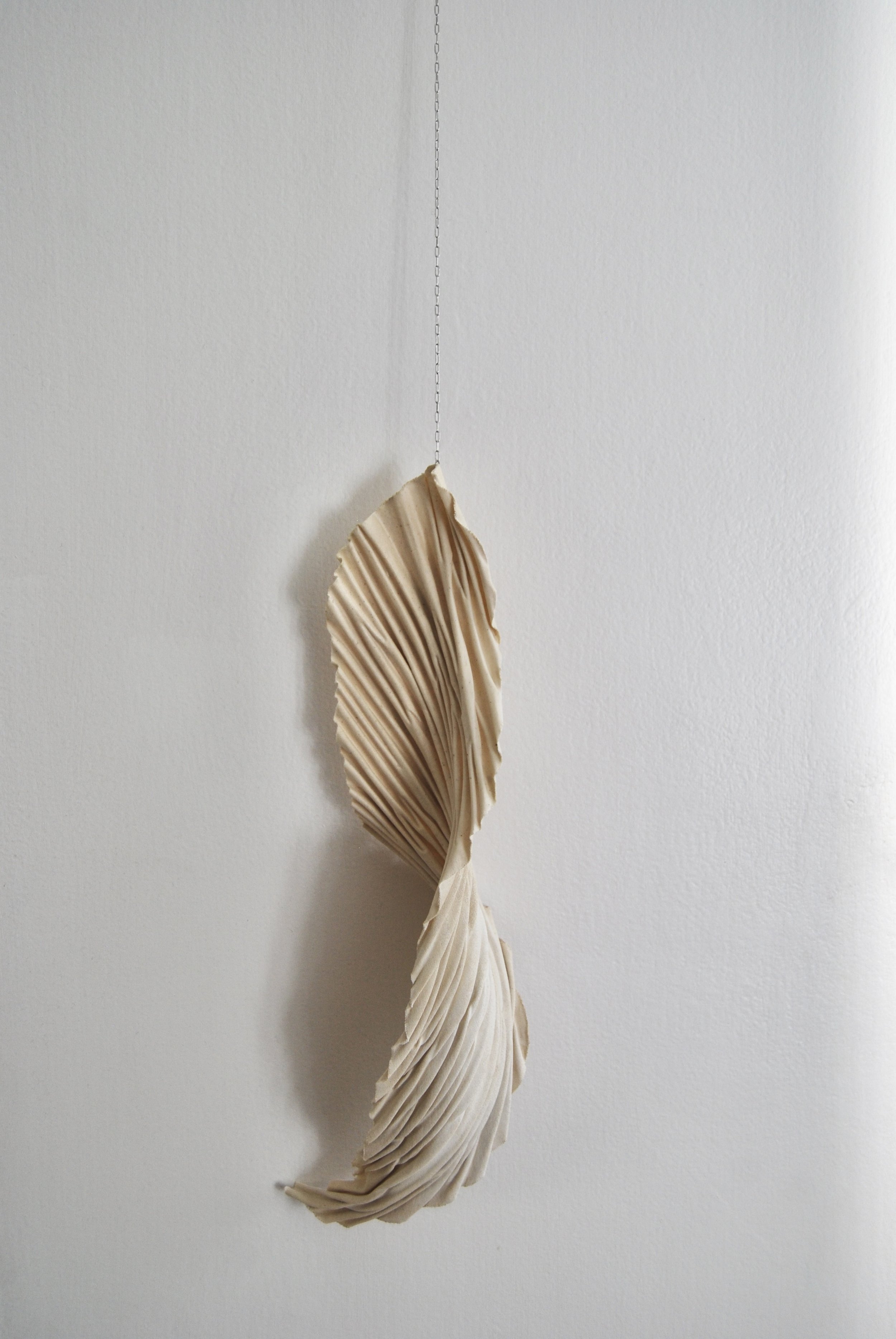 I'll Fly Away /
17 1/2" H x 4" D /
Arashi Shibori Pleated Canvas, Acrylic Paint, Archival Adhesive, Silver Chain (2023) / Inquire for pricing