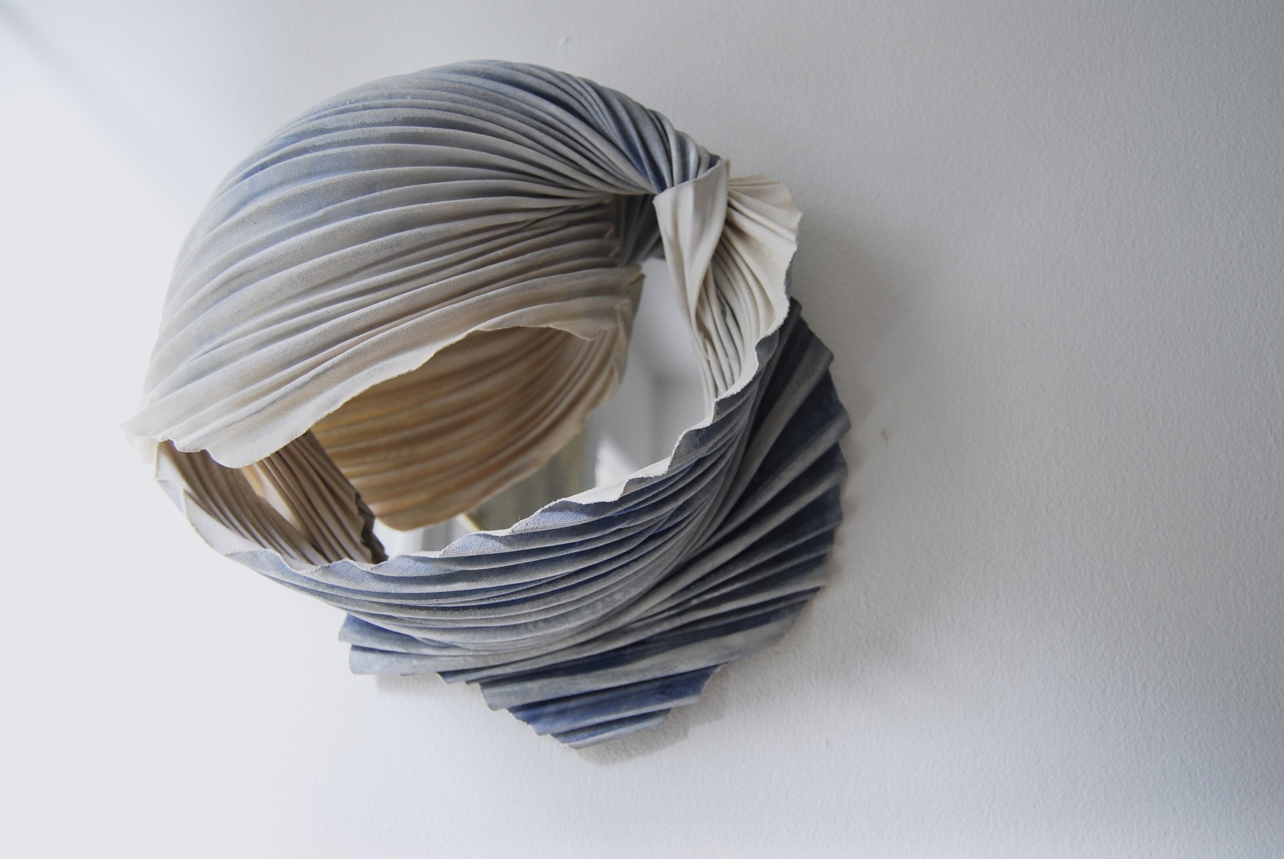 Haven /
12" Wx 12" H x 5" D /
Arashi Shibori Pleated Canvas, Acrylic Paint, Archival Adhesive, Mirror (2023) / Inquire for pricing