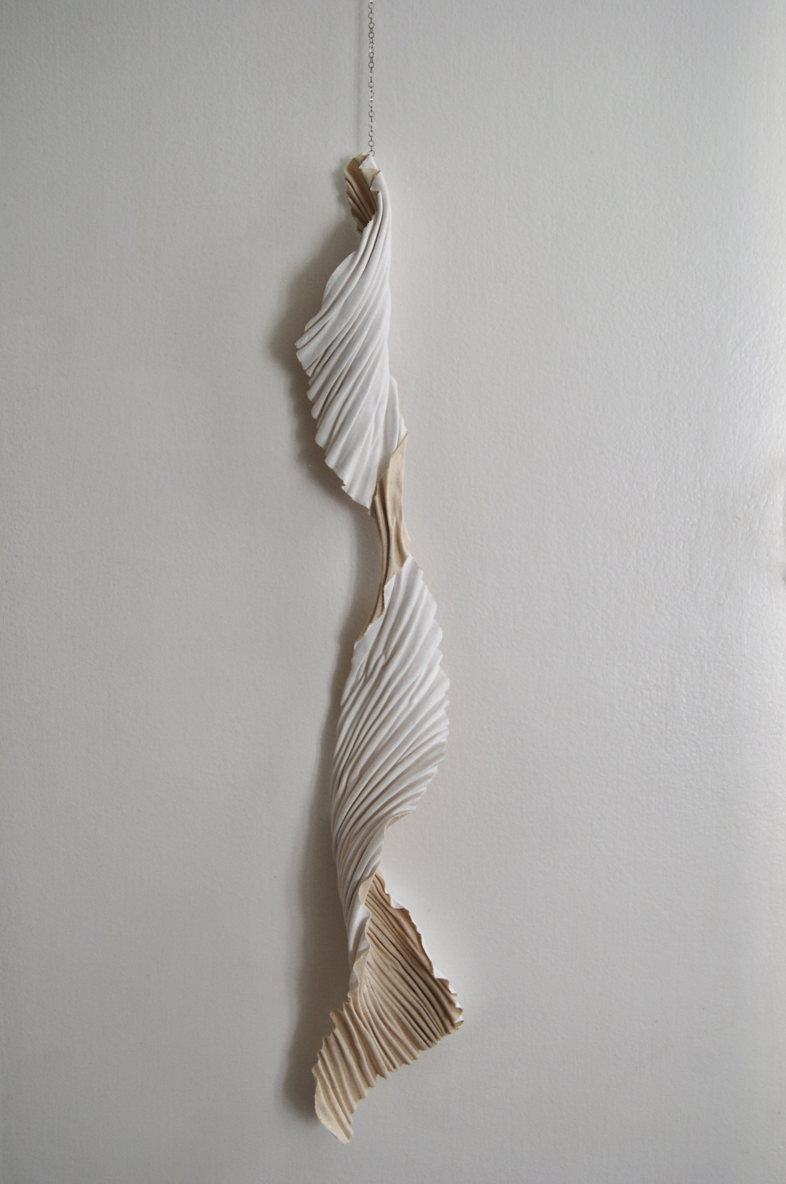 Hills and Valleys /
26" H x 4" D /
Arashi Shibori Pleated Canvas, Archival Adhesive, Silver Chain (2024) / Inquire for pricing