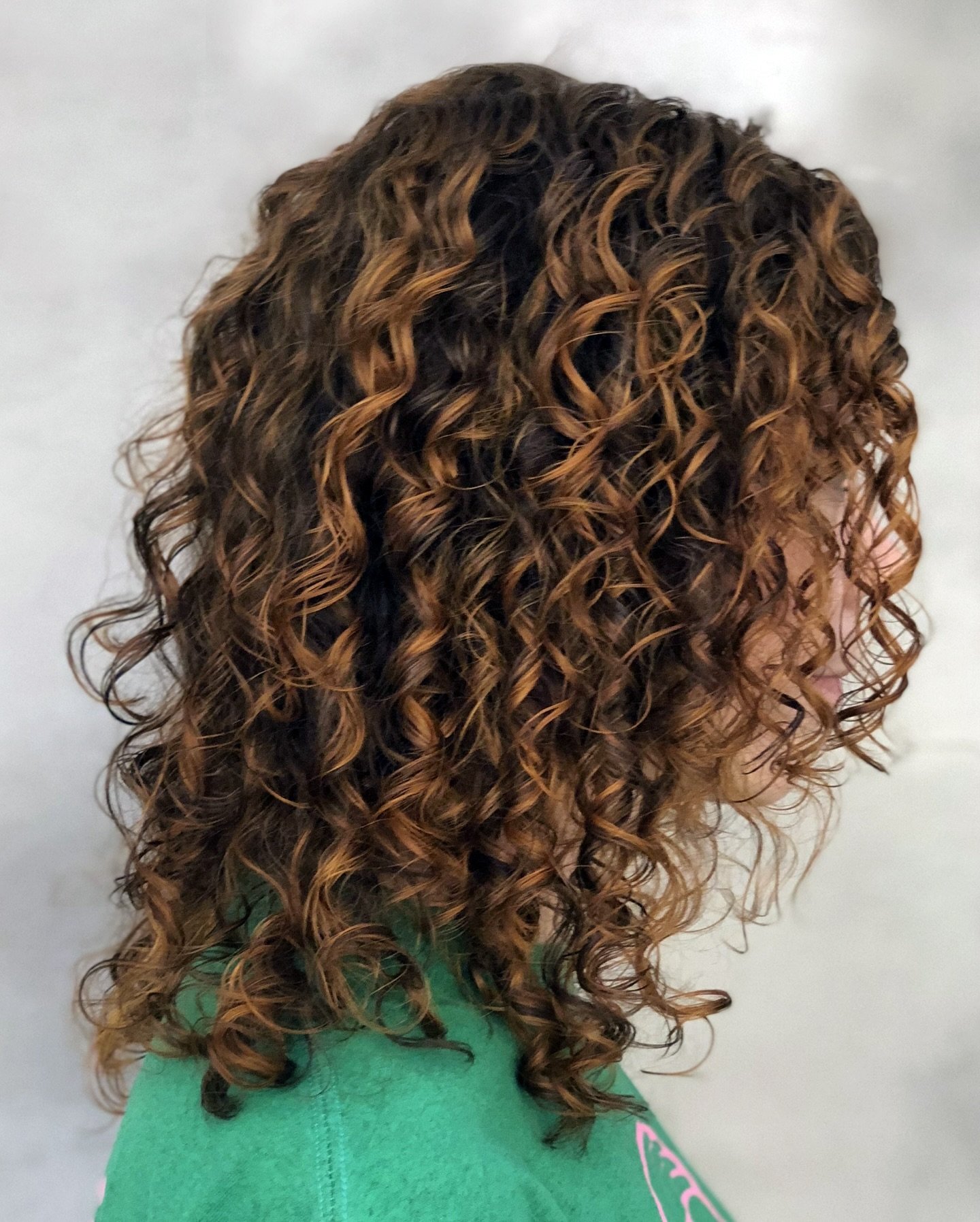 One thing to remember with curly hair is that if highlights aren&rsquo;t placed with some strength and impact, they can completely disappear into the hair and be too subtle. The texture in the waves scatters light differently and diffuses the brightn