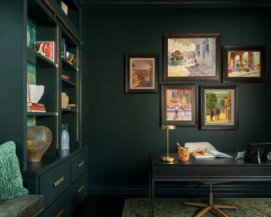 Another vantage point... this office transformation is all about balance: a custom built-in for function, a perfectly placed desk for purpose, and a simple gallery wall displaying purposefully selected artwork collected from their travels -- adding p