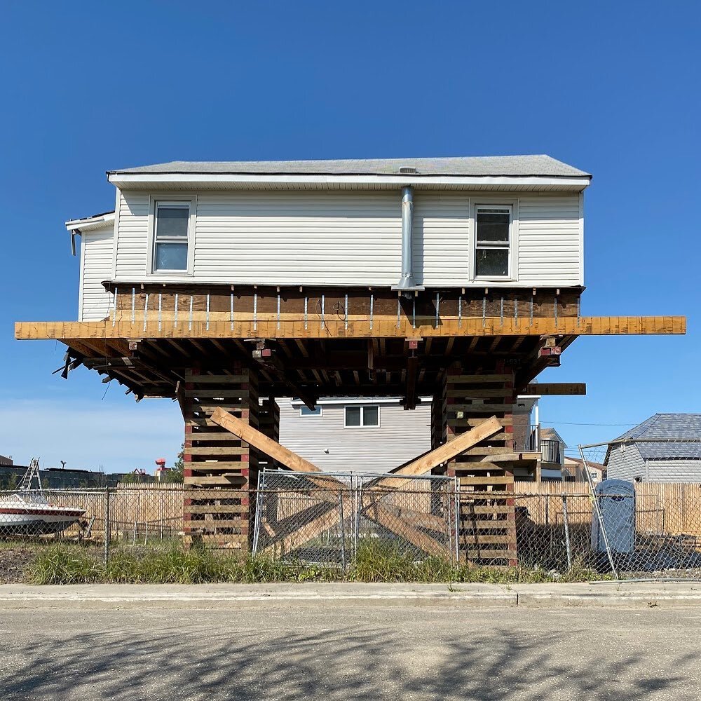 New York City is expected to experience 3-6 feet of sea level rise by 2100. In some areas, like here in Meadowmere at the Queens/Nassau County border, homeowners are elevating their houses to avoid sea level rise. Without comprehensive planning, road
