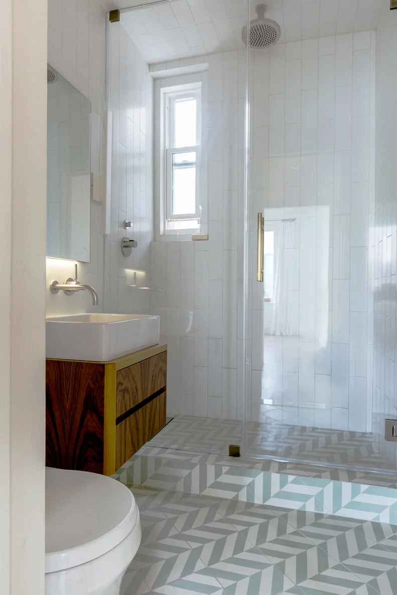 Brooklyn Heights Bathroom remodel with green and white floors and wood fixtures