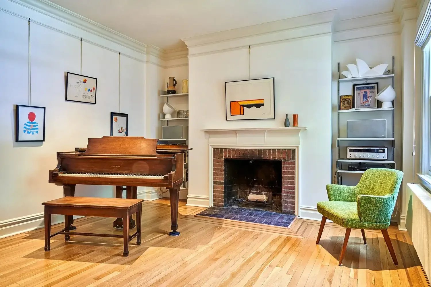 Living room fireplace, shelving, and furnishing details from a complete townhouse transformation in the Upper East Side, Manhattan, New York City
