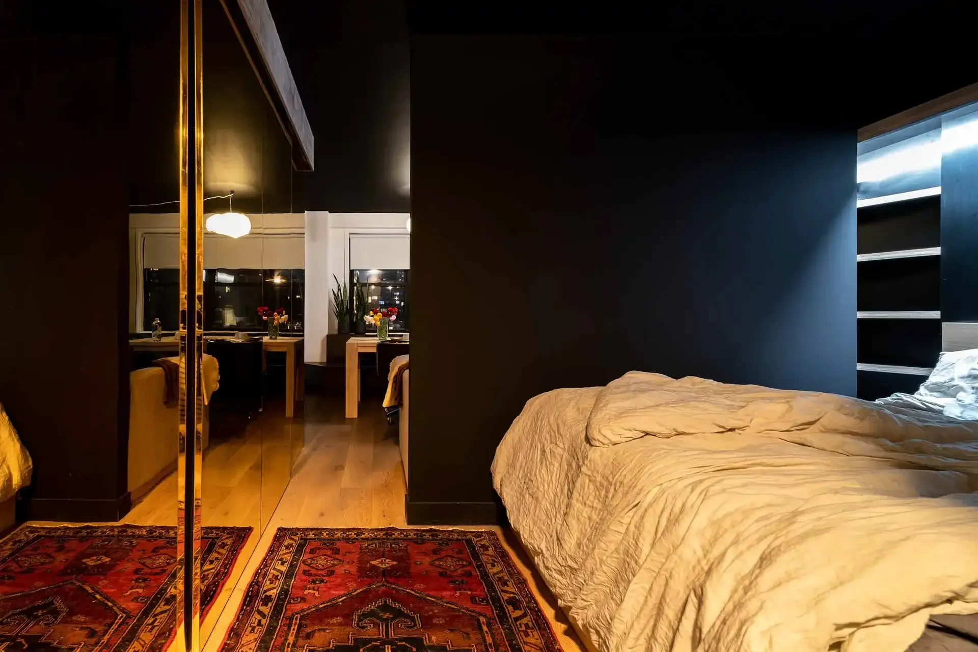 Bedroom and mirror in NYC apartment