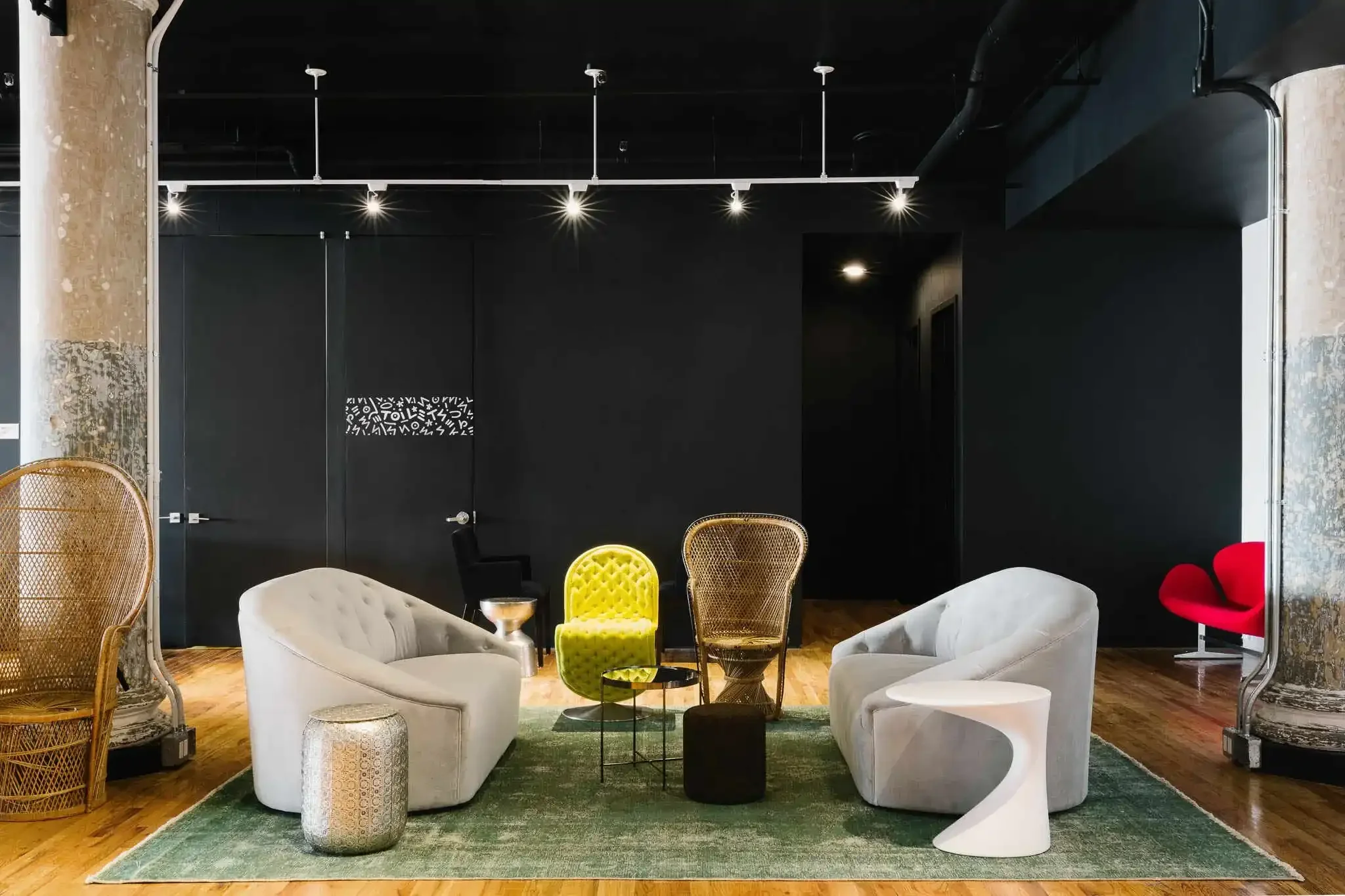 Office lounge area with unique accent chairs