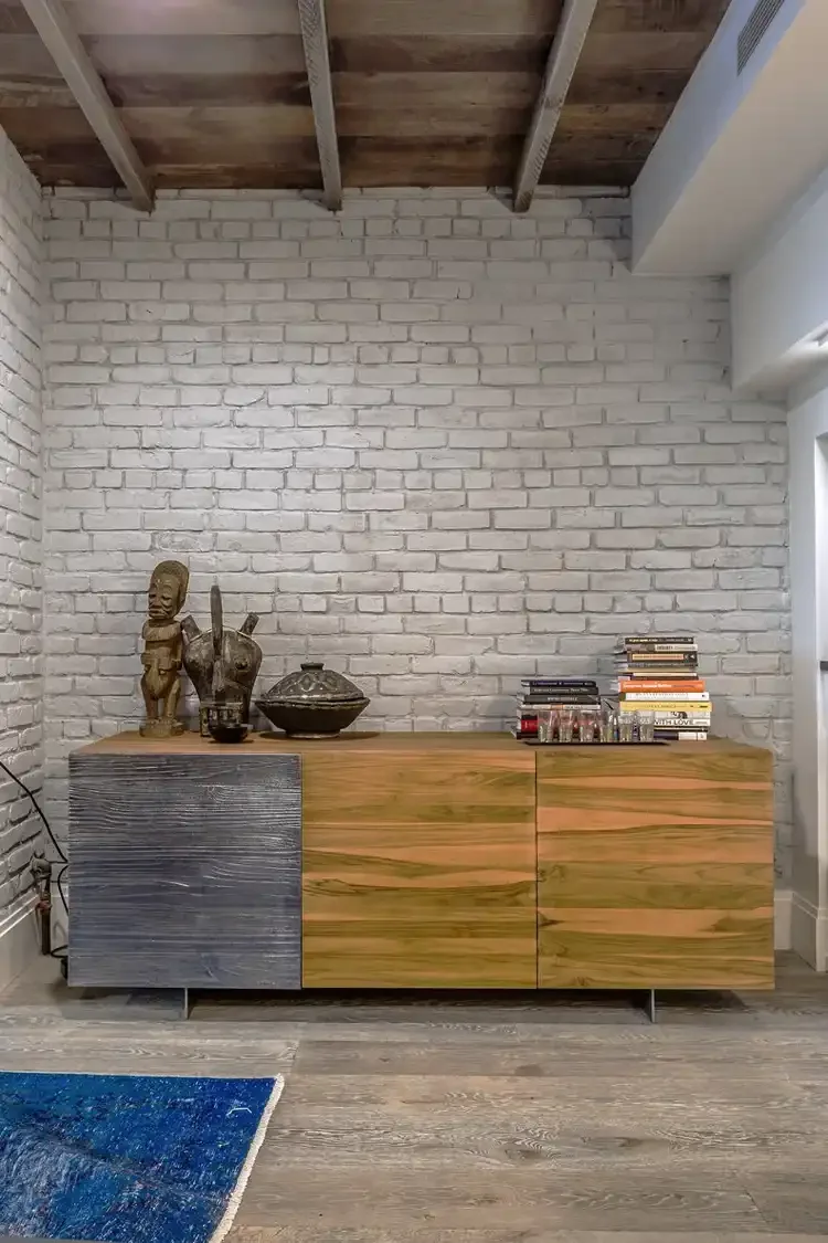 Chelsea apartment interior design with oak ceiling and oak credenza
