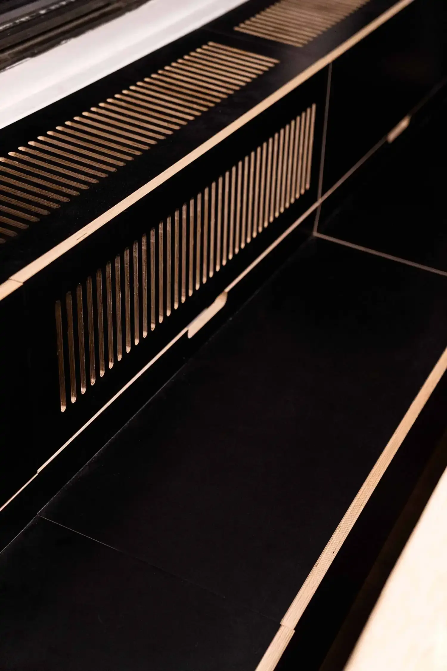 Custom millwork view from a thorough makeover of a Gramercy, Manhattan studio apartment