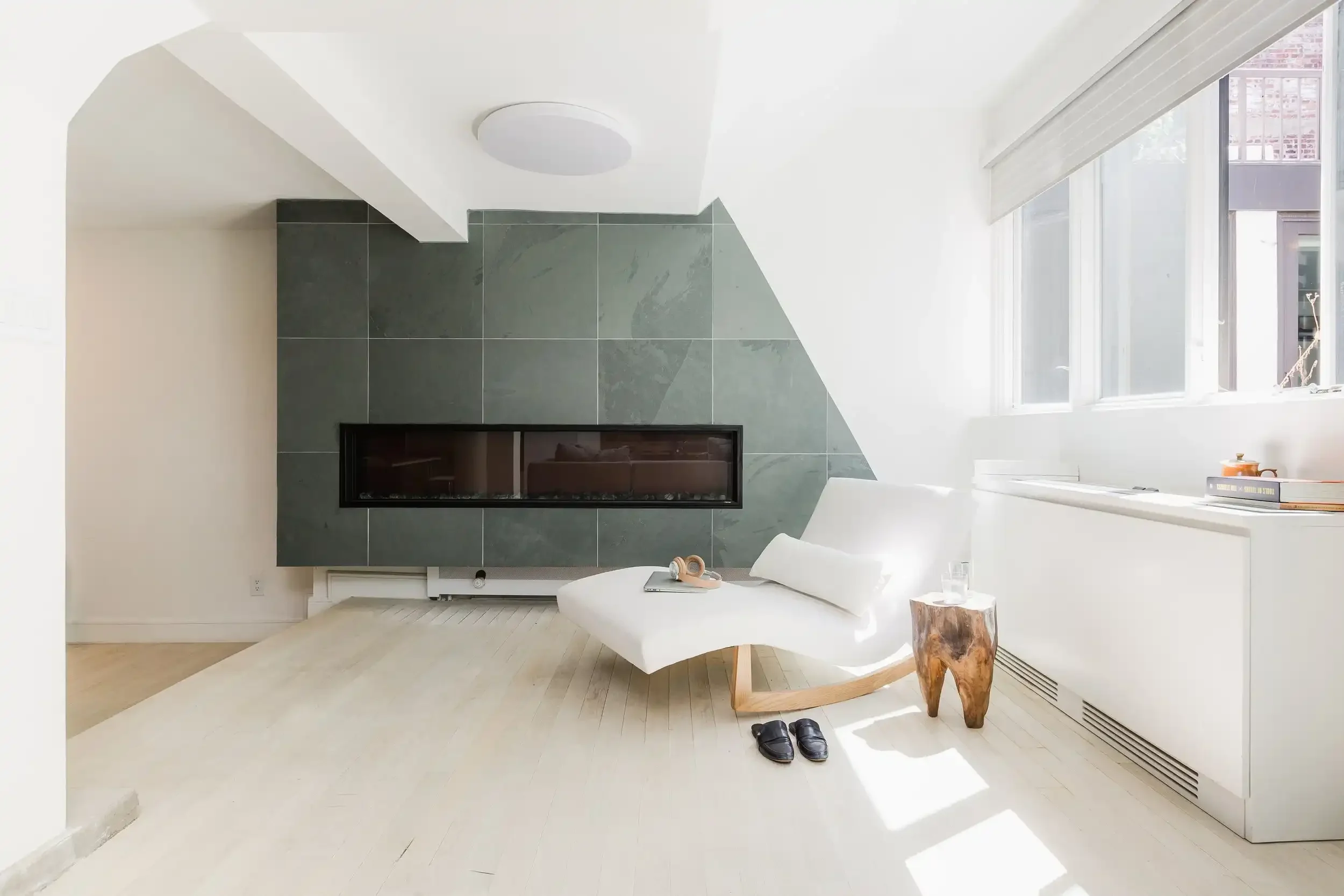 Green slate wall and lounge chair