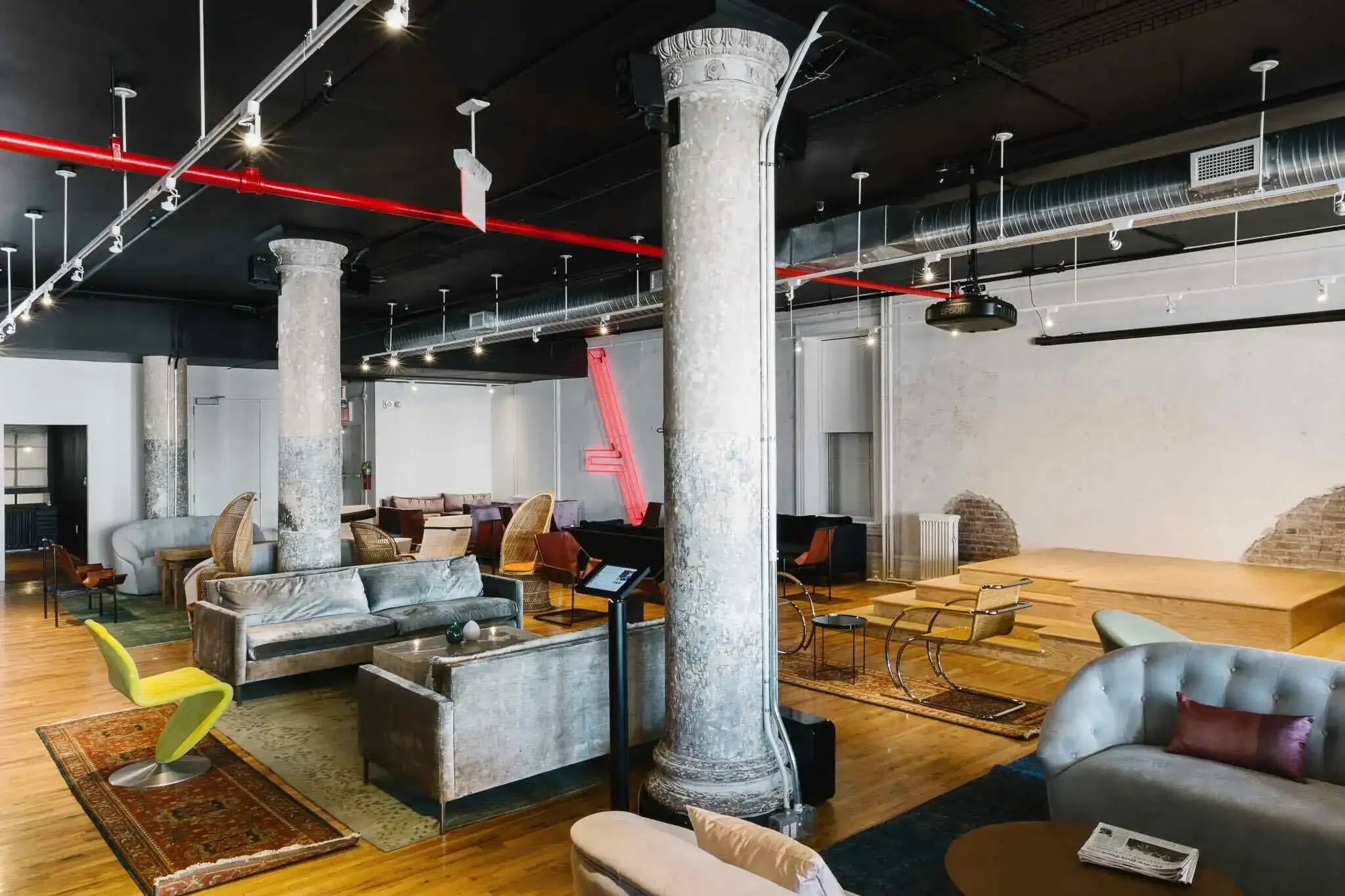 Large living room with red accents