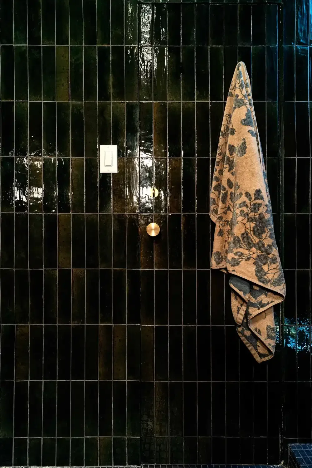 Seamless tiled door view from the ground-up renovation of a Manhattan studio in the Gramercy area