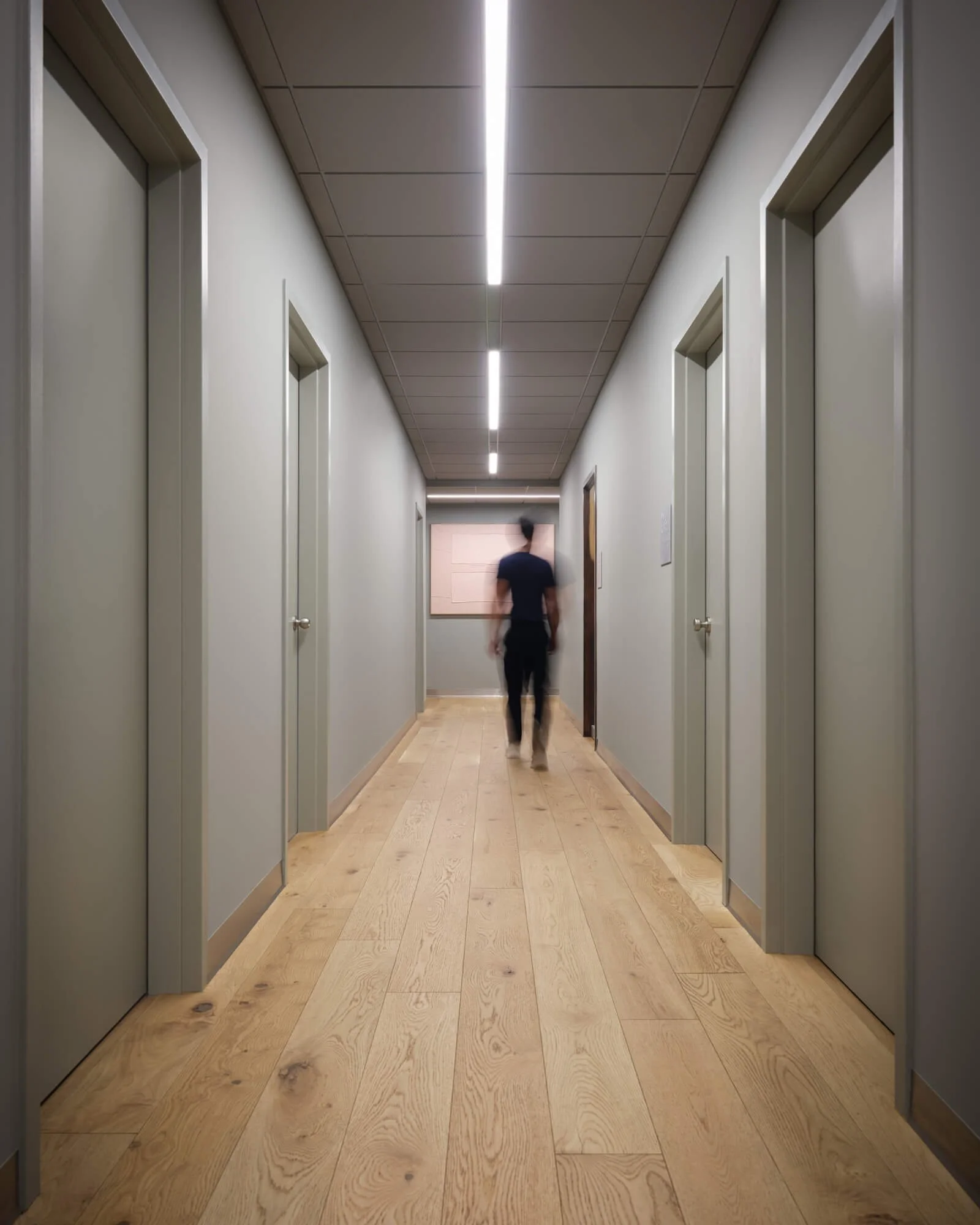 Linear Ceiling LED Lighting in Main Workspace Corridor for a Commercial Space by Mammoth