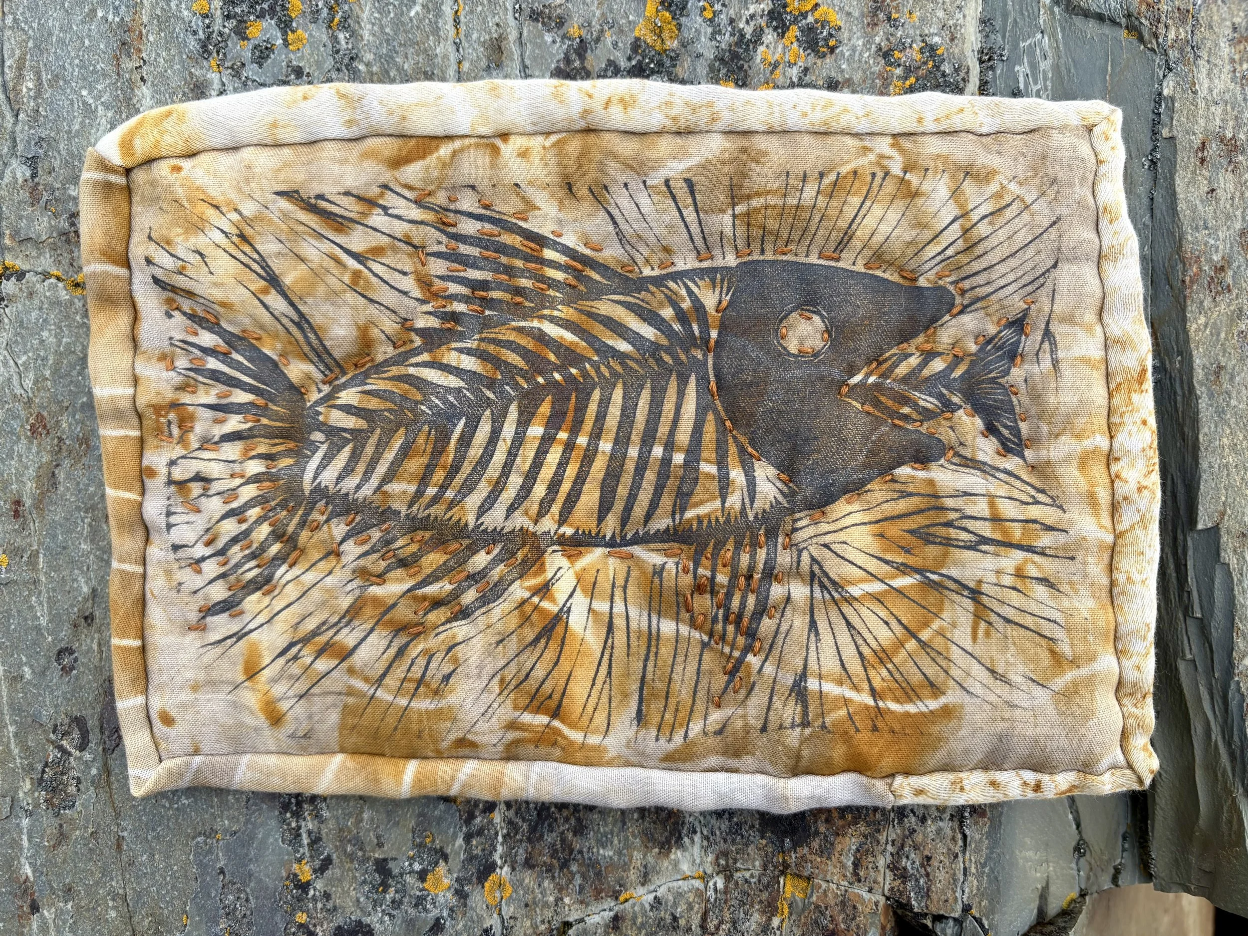 "Eater and Eaten," linocut print on rust-printed miniature quilt