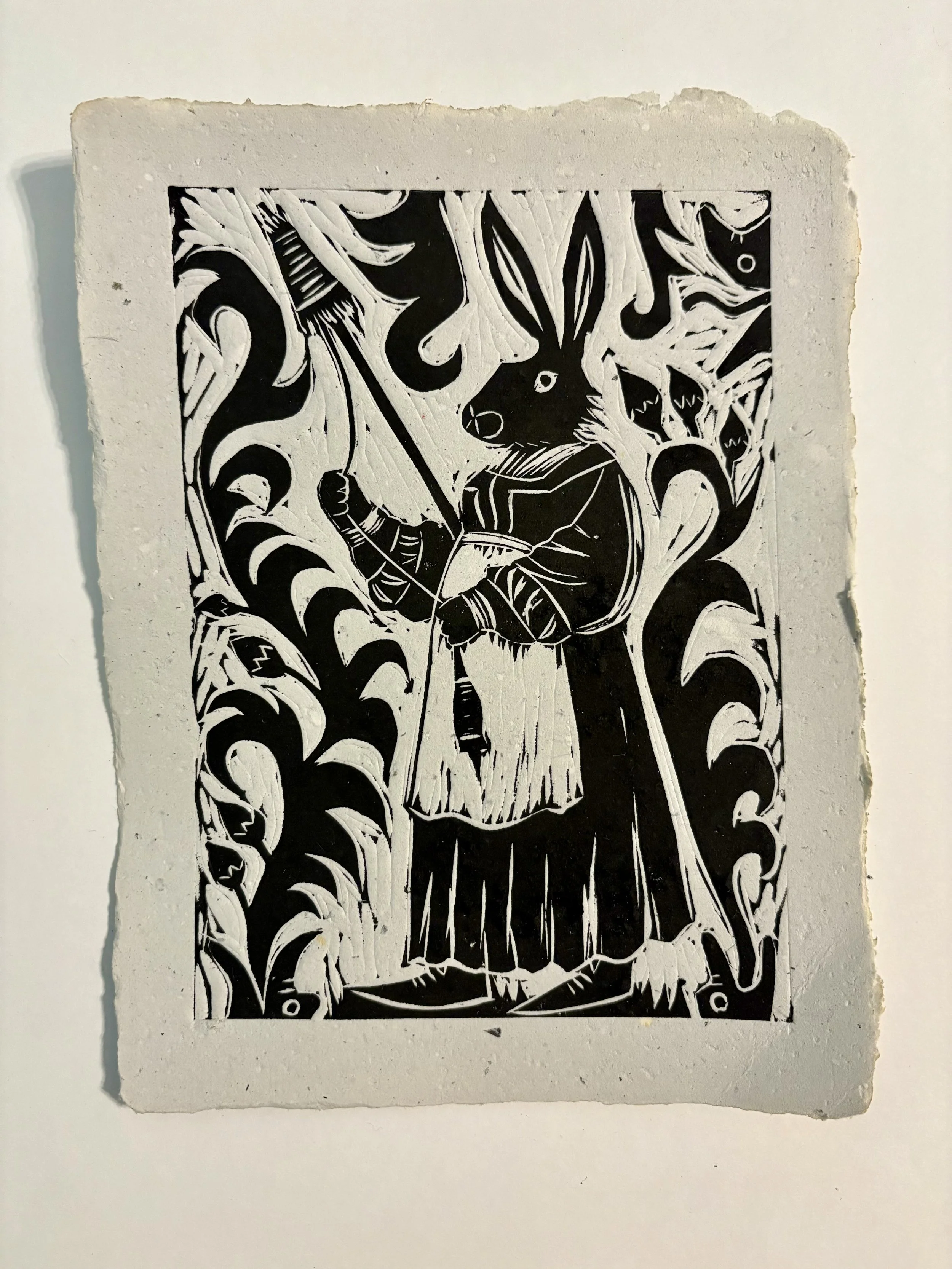 "Spinning Hare," linocut print on handmade paper