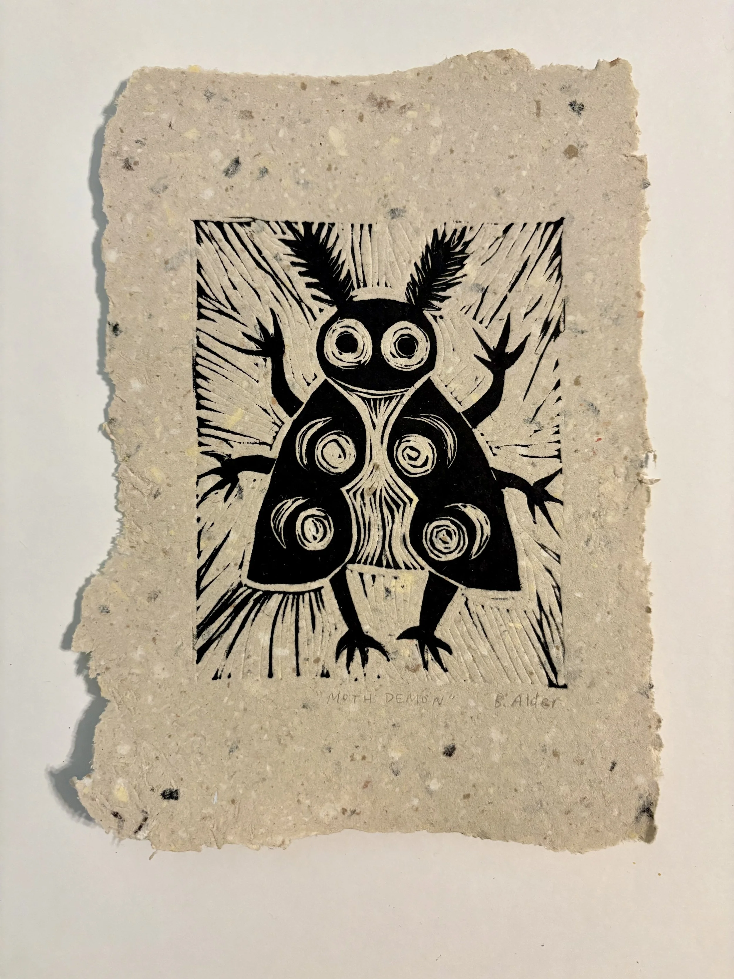 "Moth Demon," linocut print on handmade paper