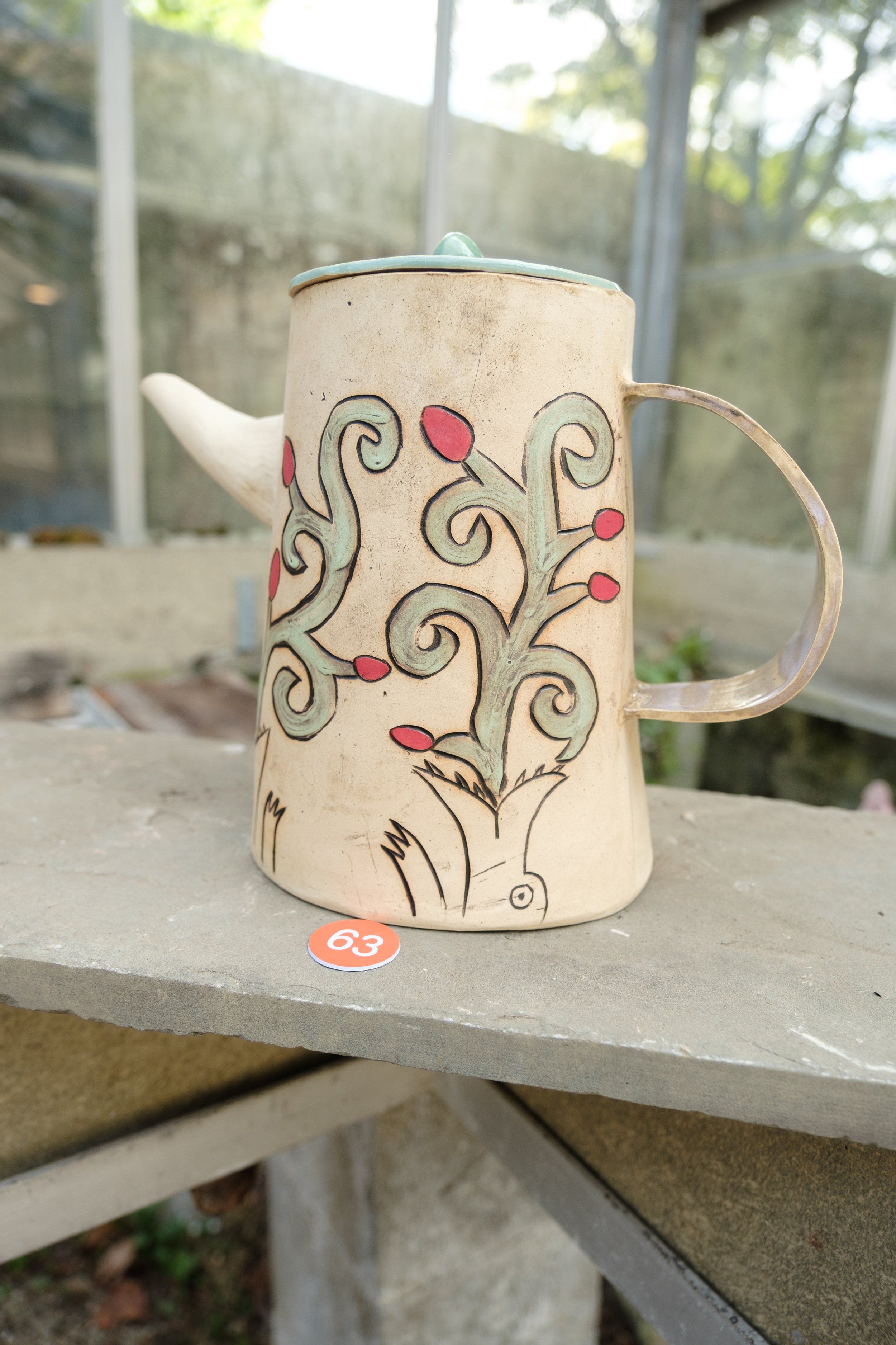 "Strawberry Dragons," ceramic teapot. Photo credit: Christoper Rosonina, curatorial credit: Site-Specific Happenings 