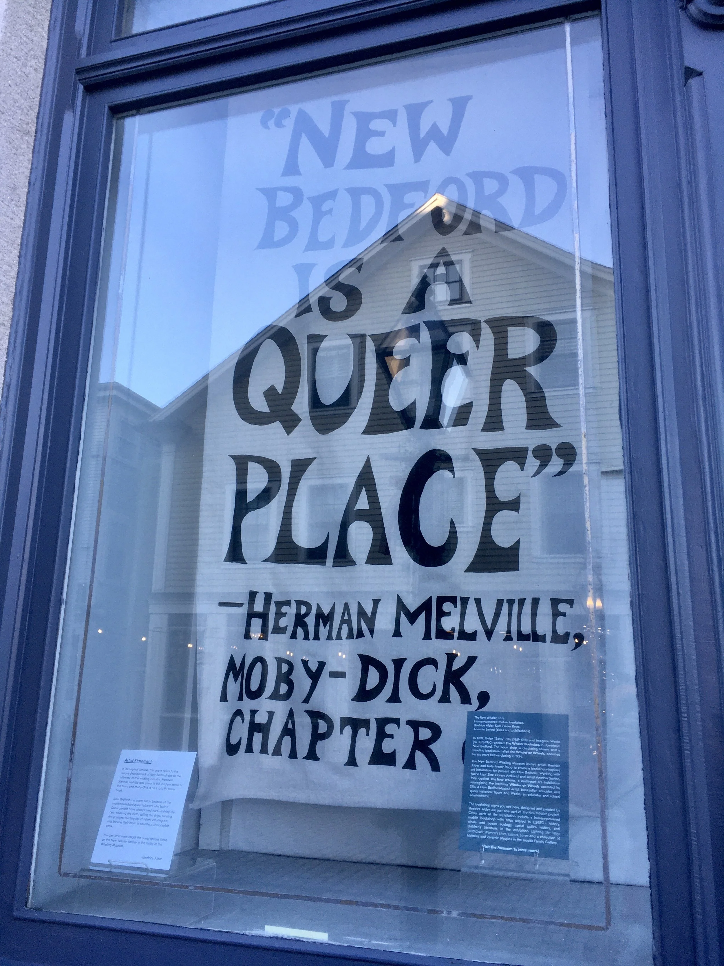 "New Bedford is a Queer Place," painted canvas banner