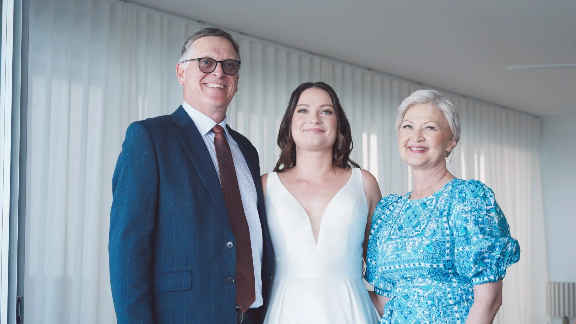 bride with her parents.jpg