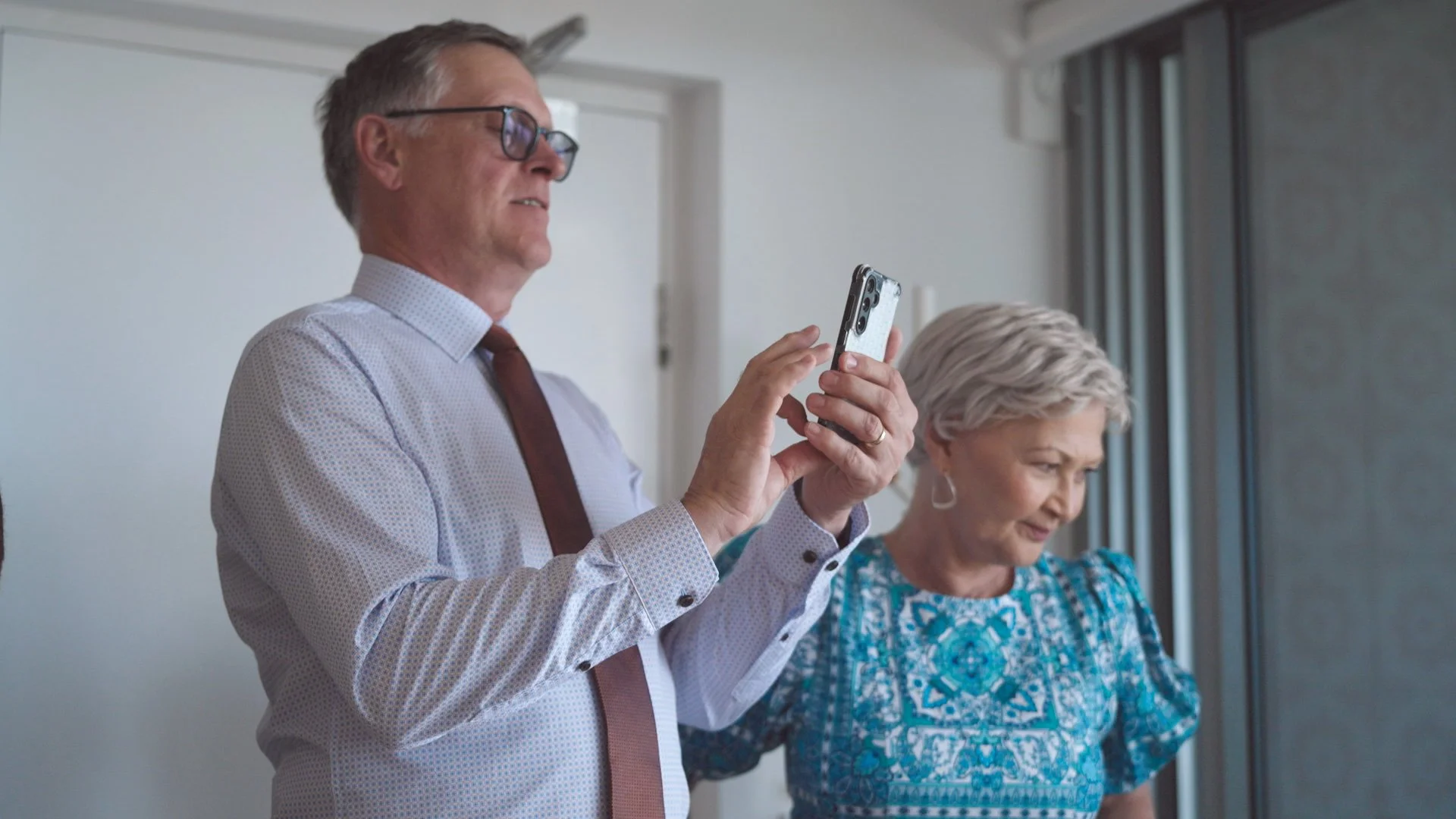 grooms father smiling.jpg