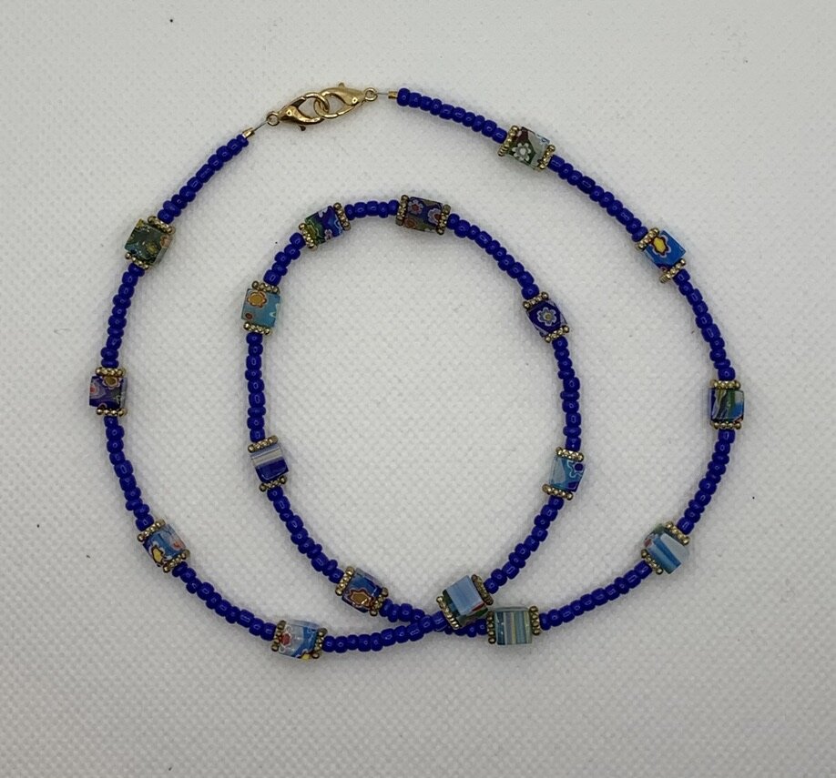 ADVENTURE IN BLUE NECKLACE FLAT.jpeg