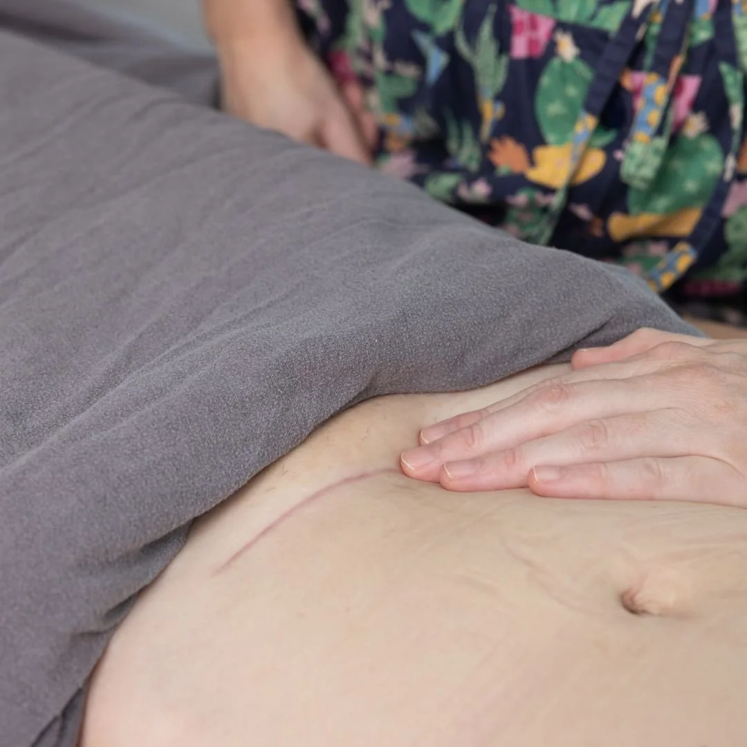 Osteopath assessing movement before dry needling treatment