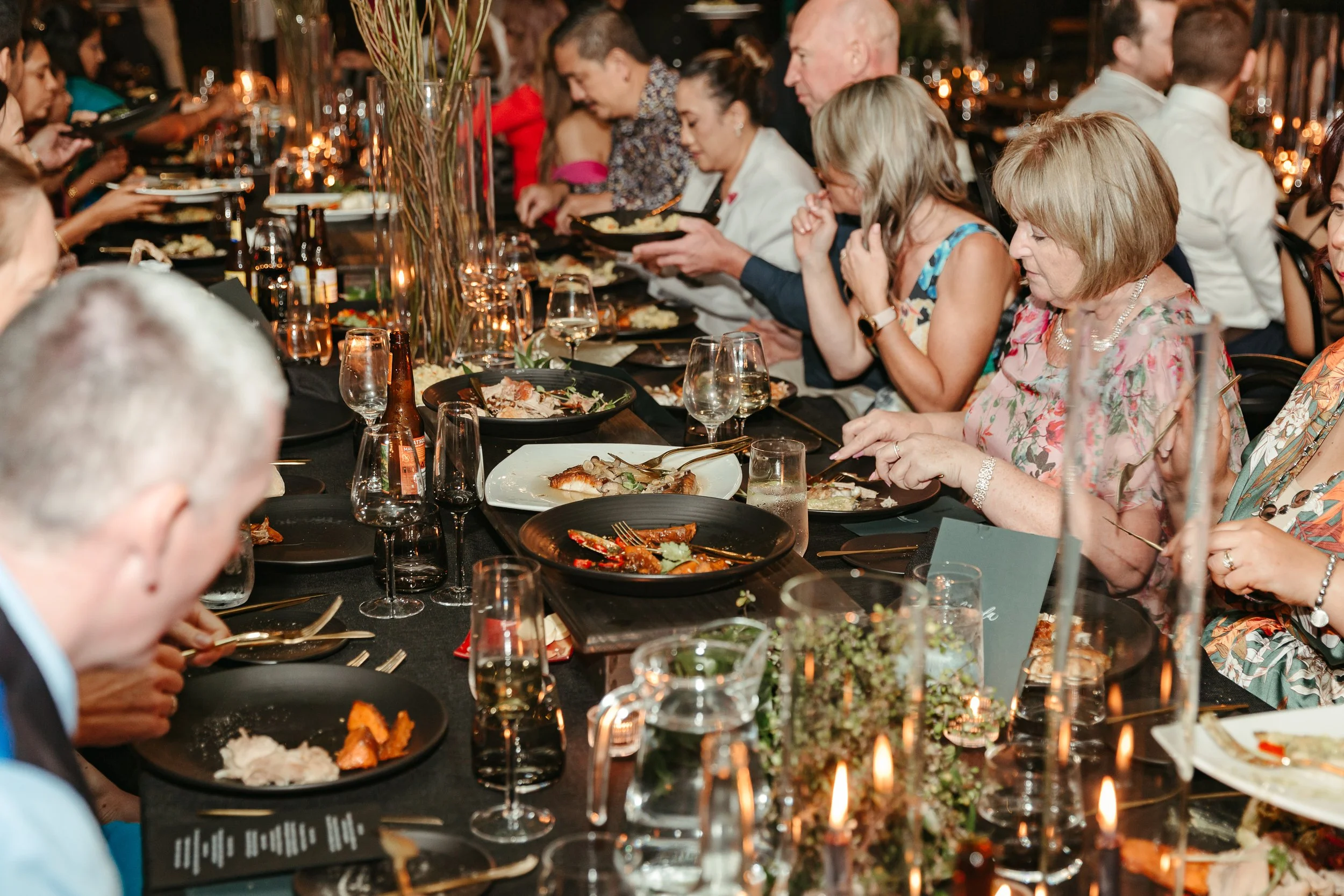 black table raiser used for shared dining at a wedding