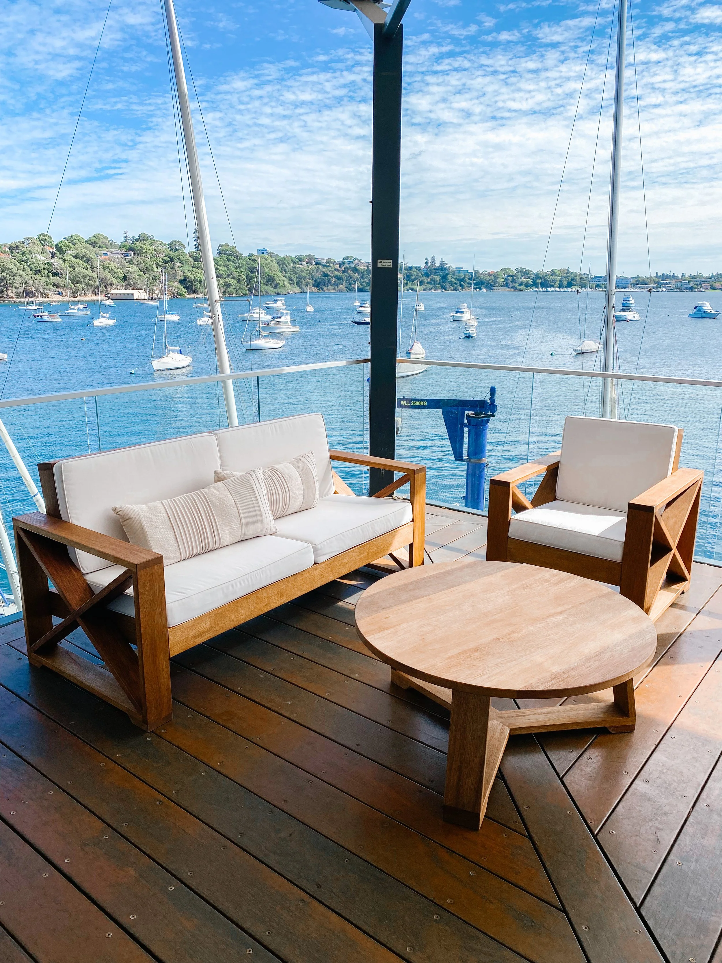 Cross Oak Arm Chair with neutral styling at Royal Freshwater Bay Yacht Club Wedding
