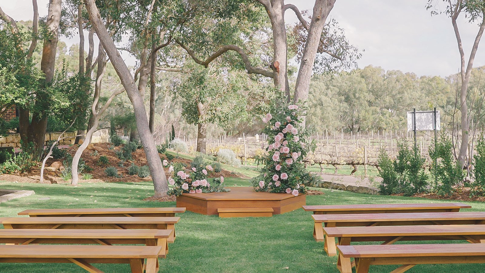 Beautiful wedding ceremony at Balmain Estate featuring Harriet bench seats