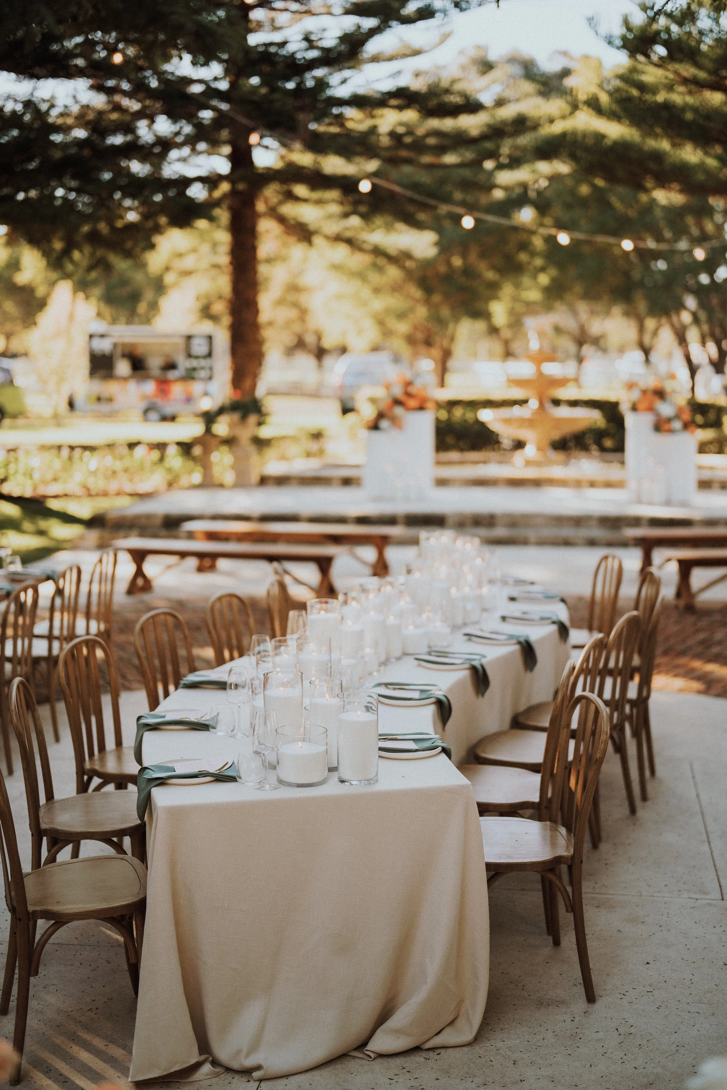 Curved tables setup in the garden at Brookleigh Estate